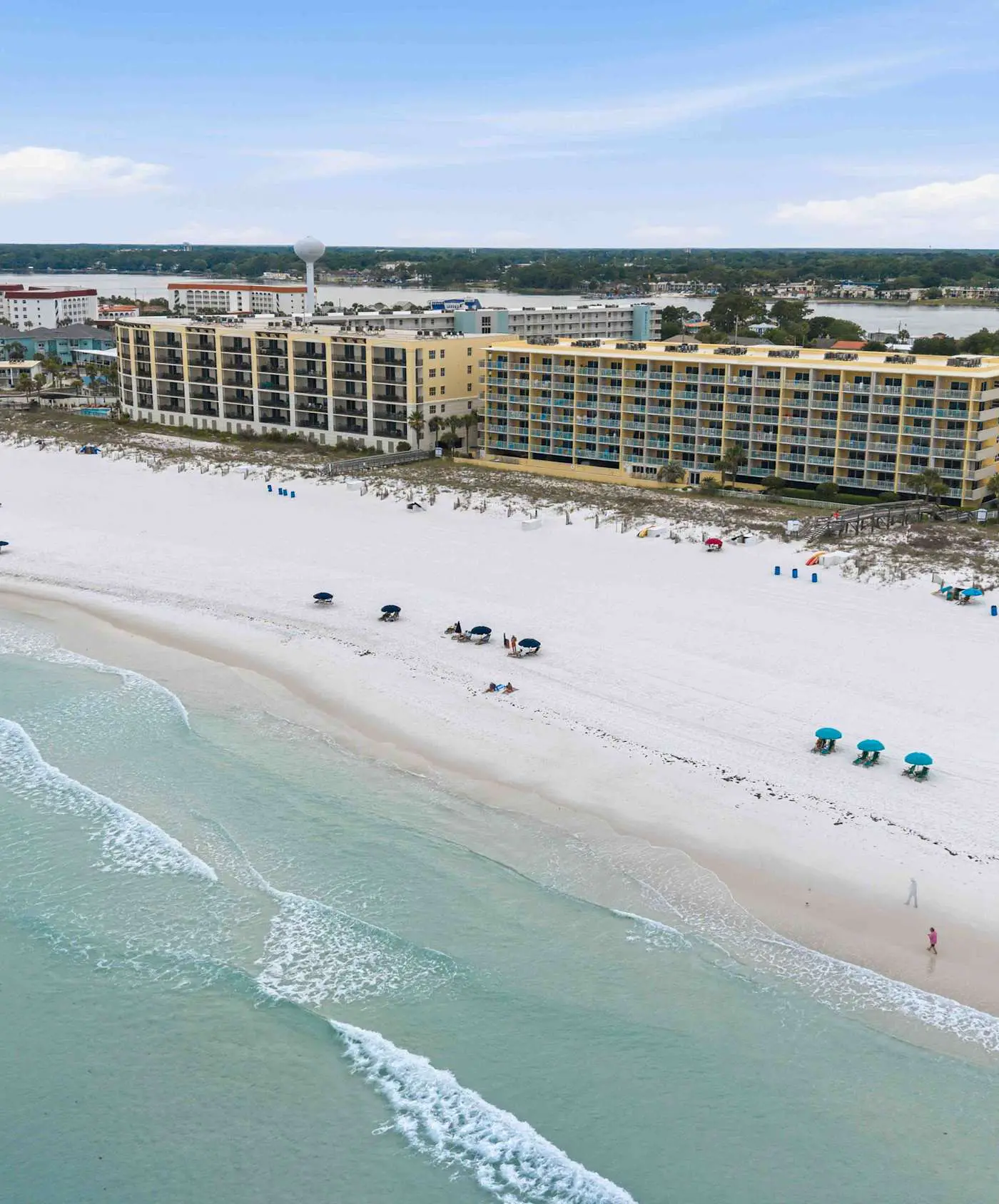 Stylish beach getaway with shared pool, private balcony, gulf views & fast WiFi