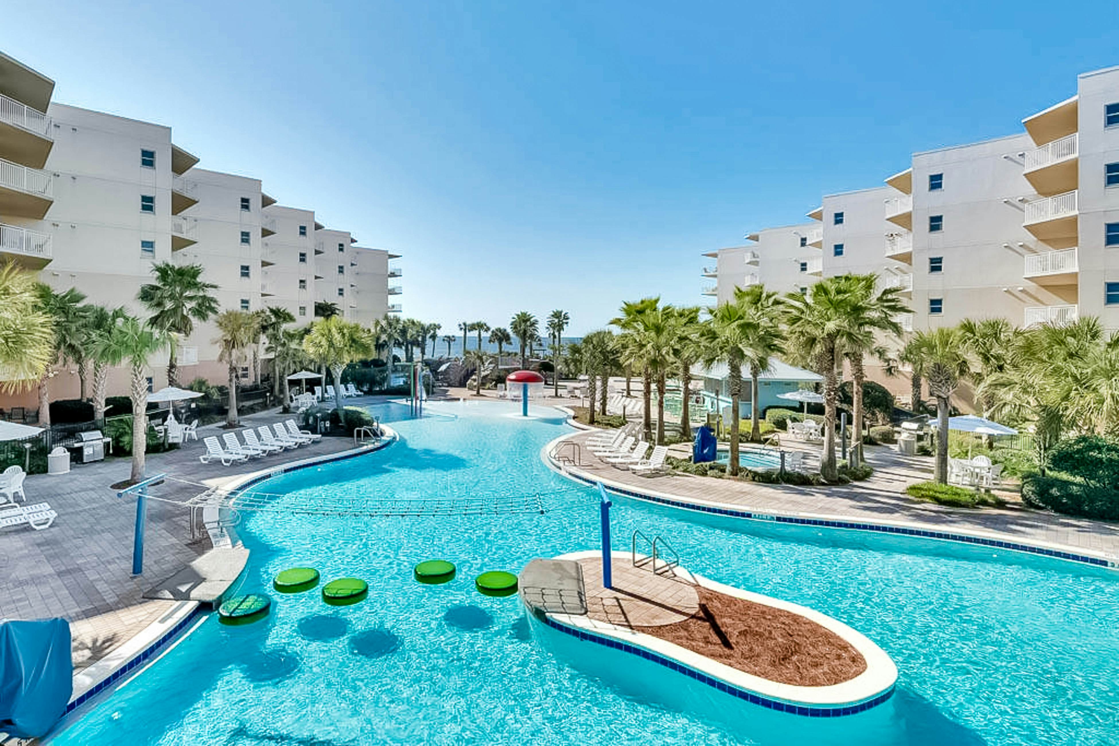 Second floor beachfront condo with pool and hot tub access, W/D, and central AC