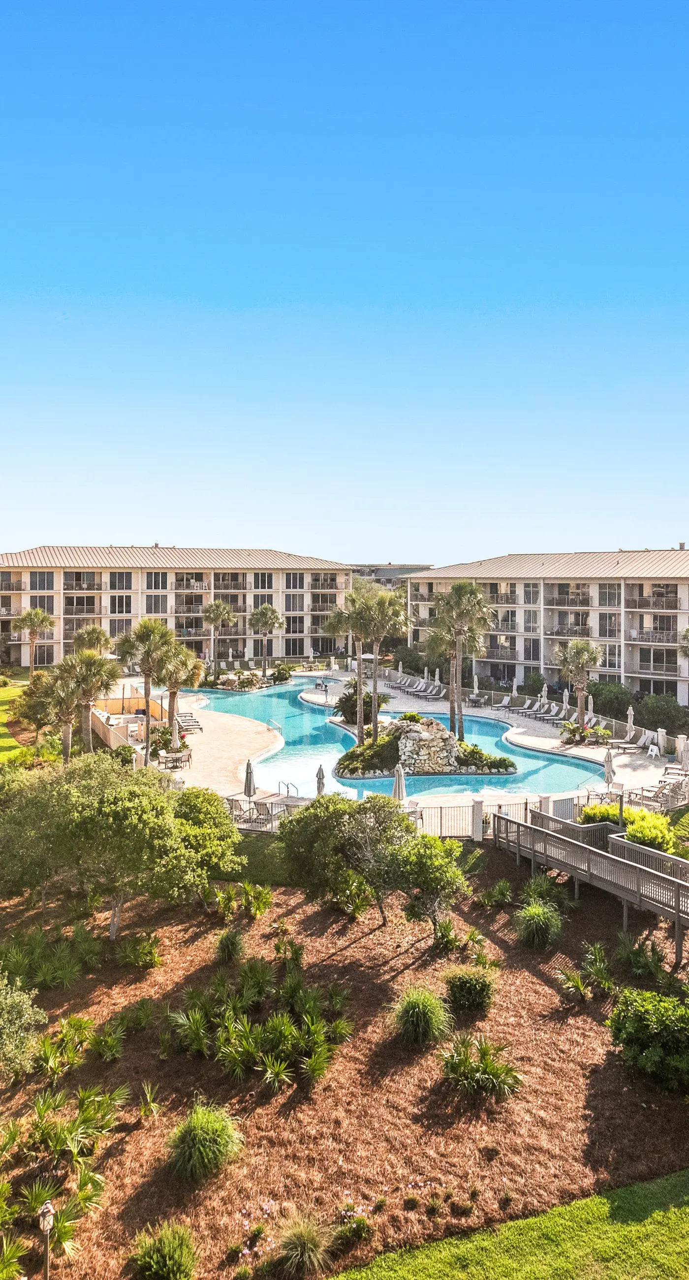 Luxuriously renovated condo with Gulf views, beach access, pool, & hot tub