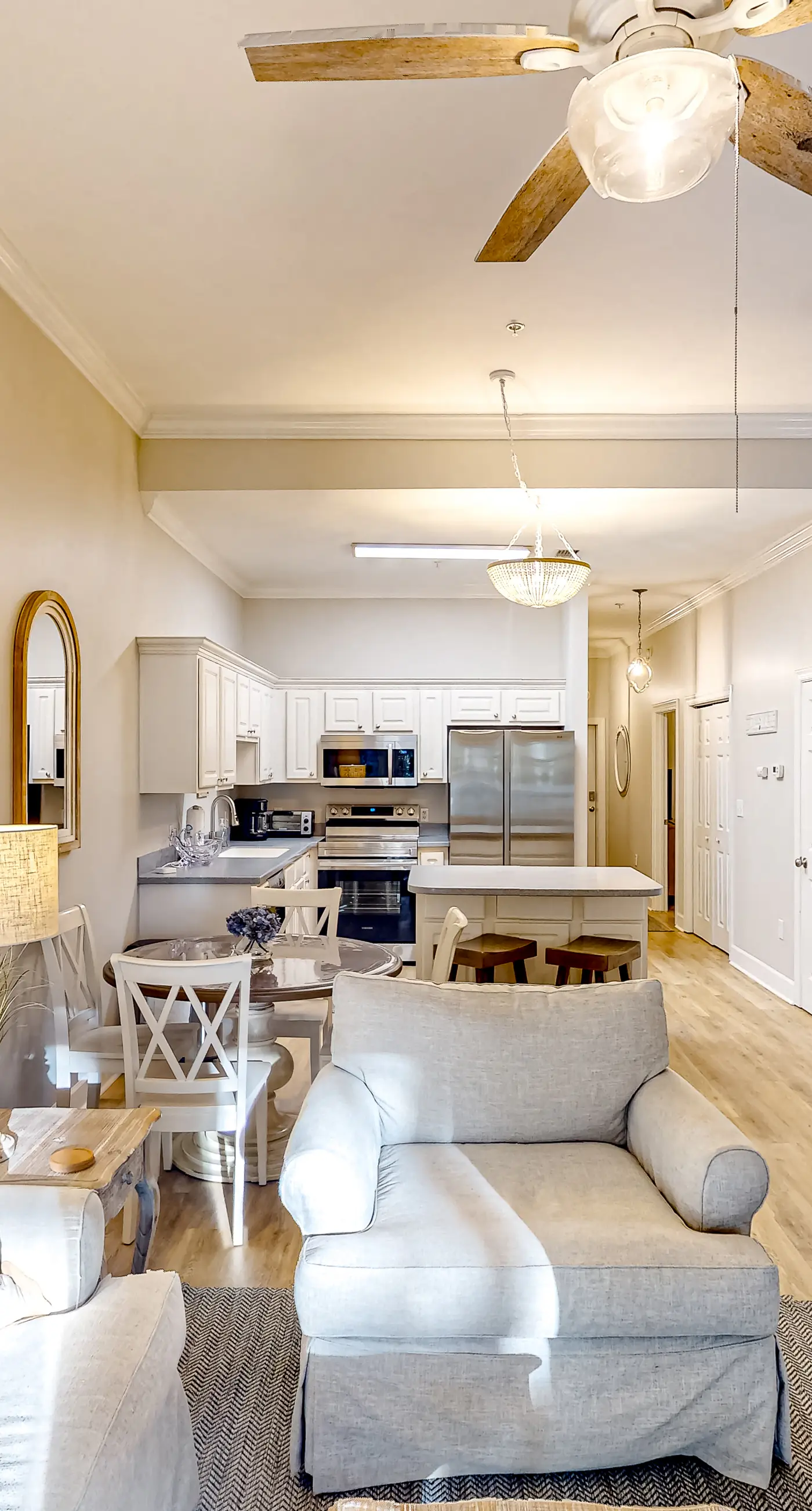 4th-floor condo near the beach with balcony, outdoor pool, elevator, W/D, & AC