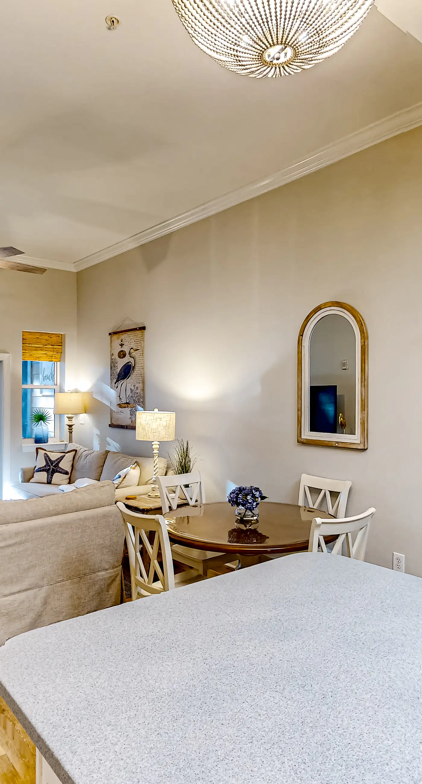 4th-floor condo near the beach with balcony, outdoor pool, elevator, W/D, & AC