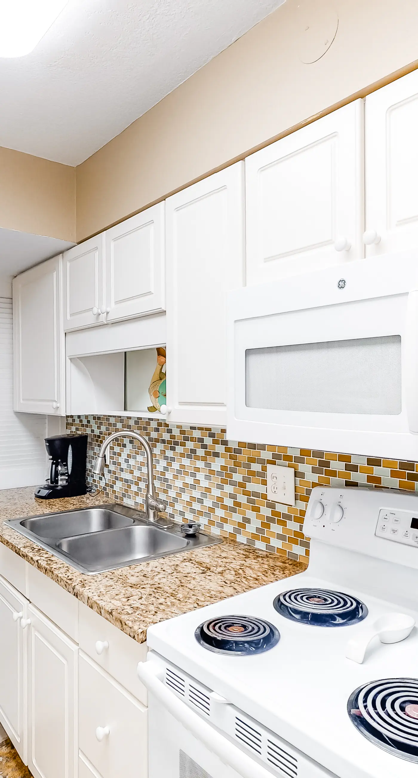 Updated, beachfront condo with beach setup - quick drive to entertainment
