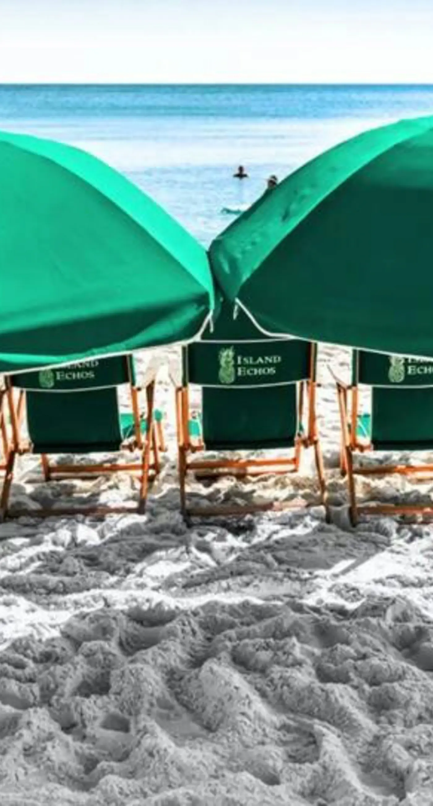 Island Echos 6E  Updated beachfront condo with beach setup & quick drive to entertainment