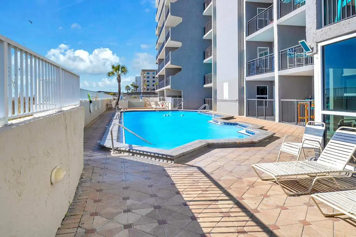 Island Echos 6E  Updated beachfront condo with beach setup & quick drive to entertainment