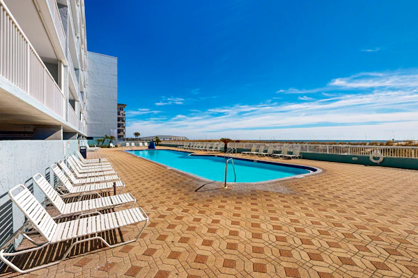 Islander W 204 - Cozy beachfront condo, beach setup included, pool, quick drive to dining