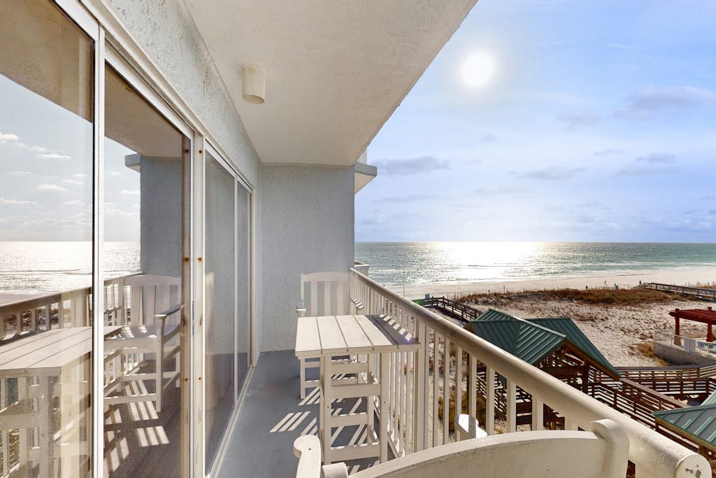 Fifth floor beachfront condo with pool access, washer/dryer, and ocean view