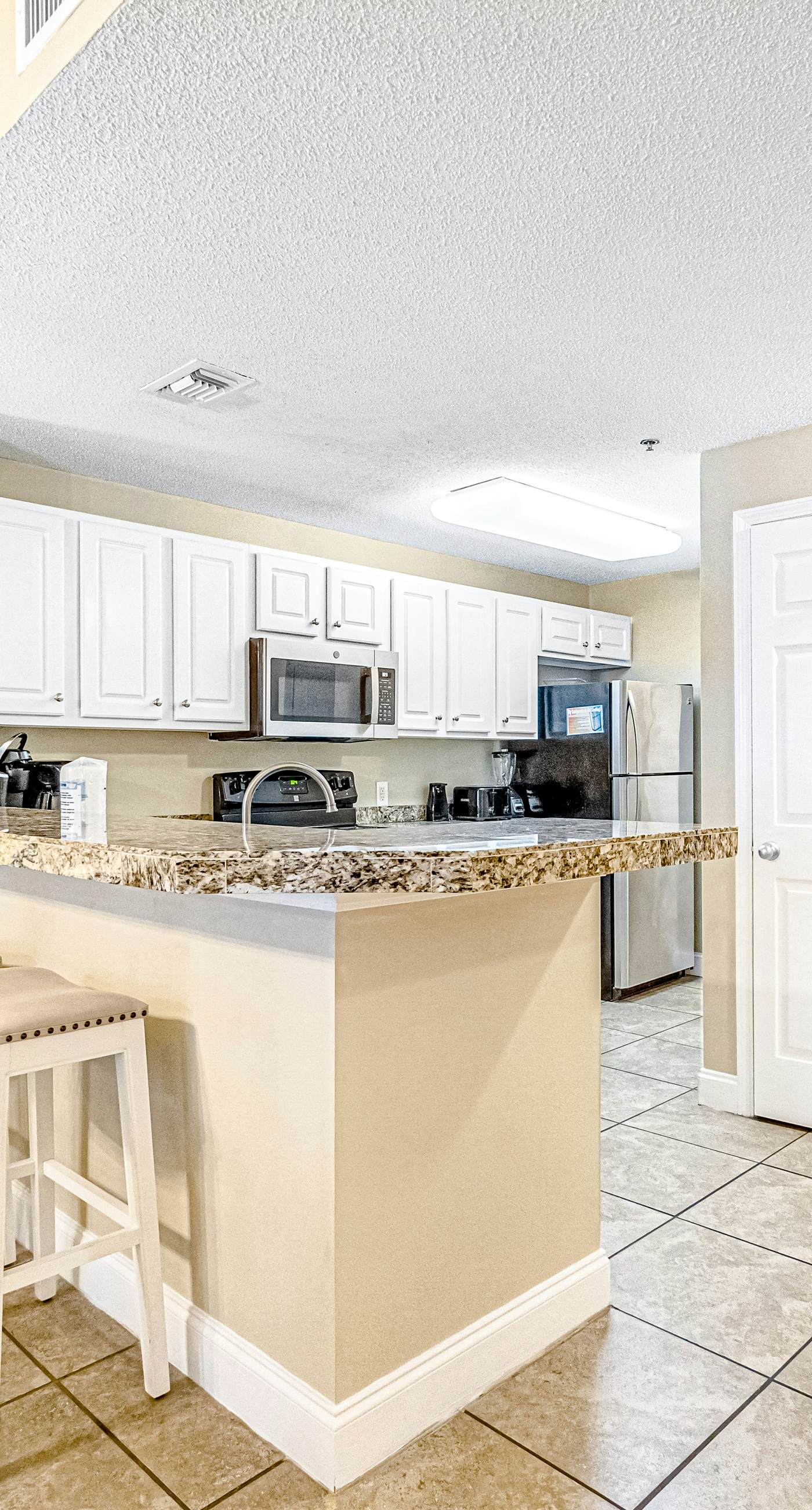 Gulf-front condo with pools, hot tub & tennis - walk to dining