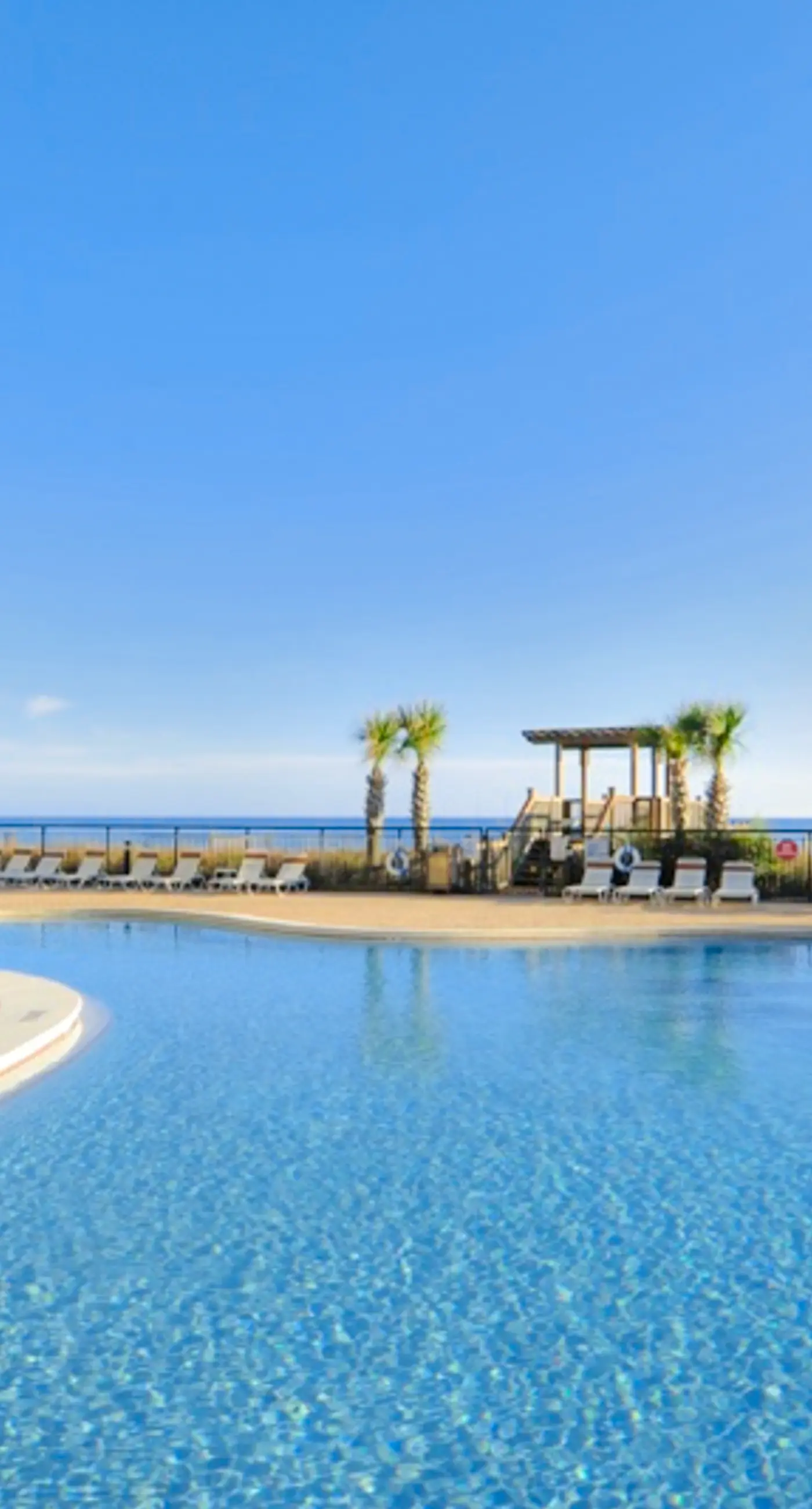 Gulf-front condo with pools, hot tub, beach access & views