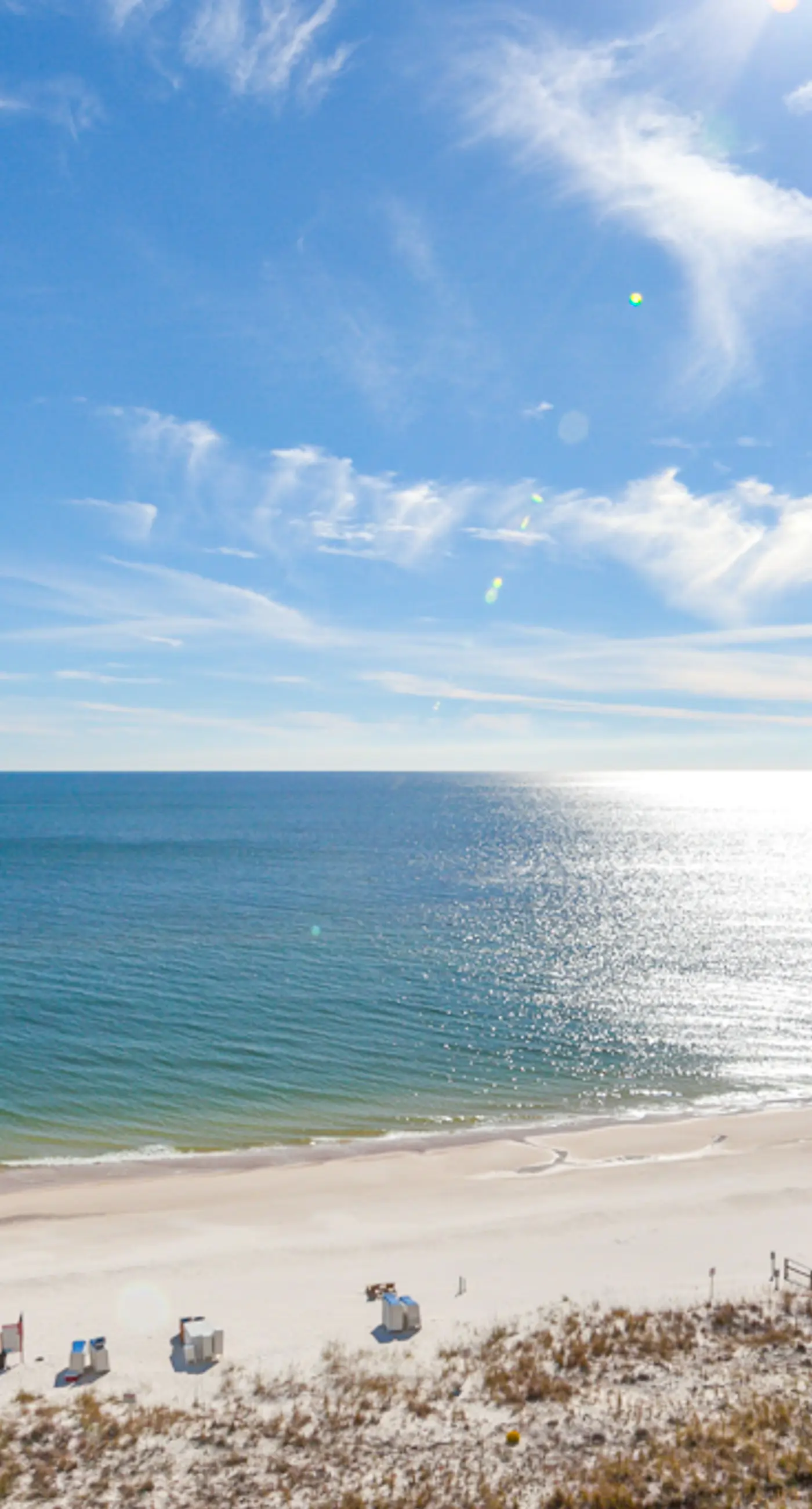 Gulf-front condo with pools, hot tub, beach access & views