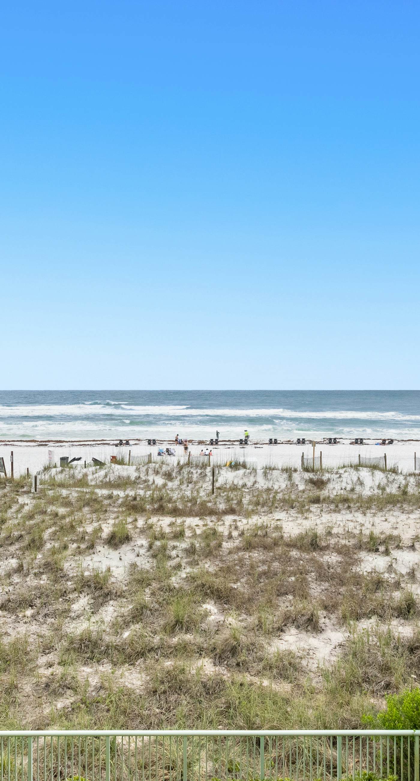 Pelican Isle 205-3rd-floor, Gulf-front condo with seasonal beach setup - near entertainment