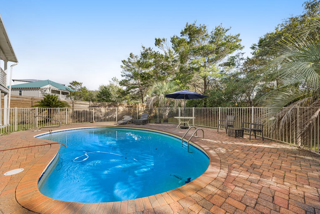 Snowbird-friendly house in Inlet Beach near beach with pool, balcony, & W/D