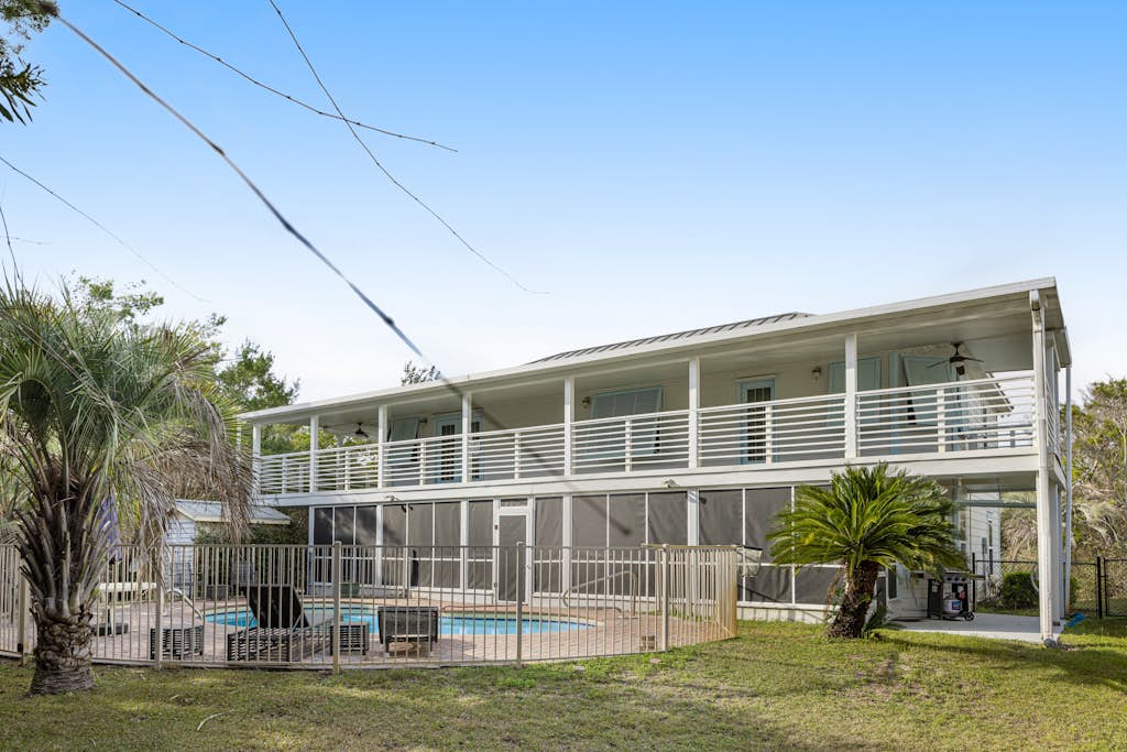 Snowbird-friendly house in Inlet Beach near beach with pool, balcony, & W/D