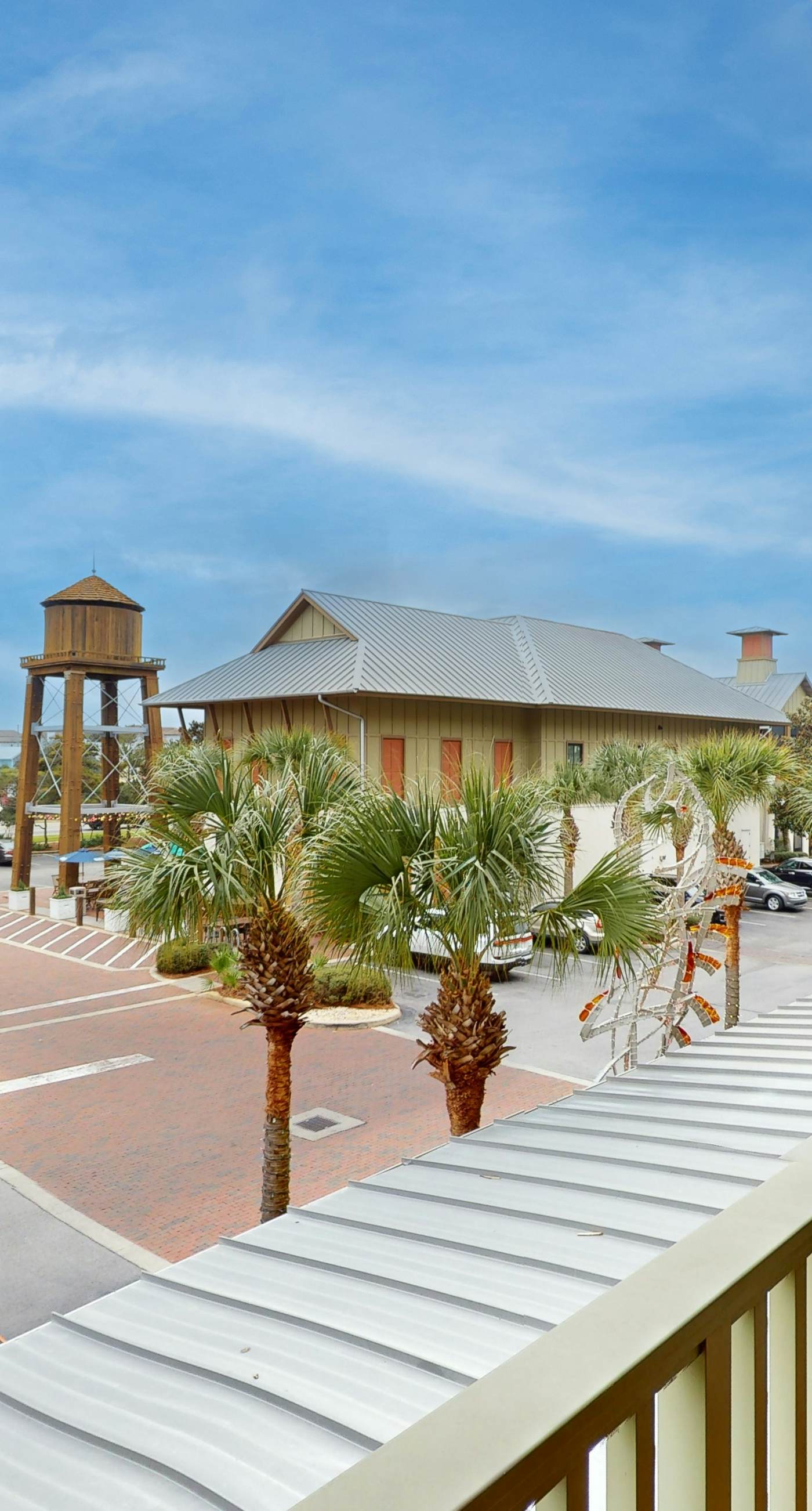 Stylish condo with pools, fitness center & tram to the beach