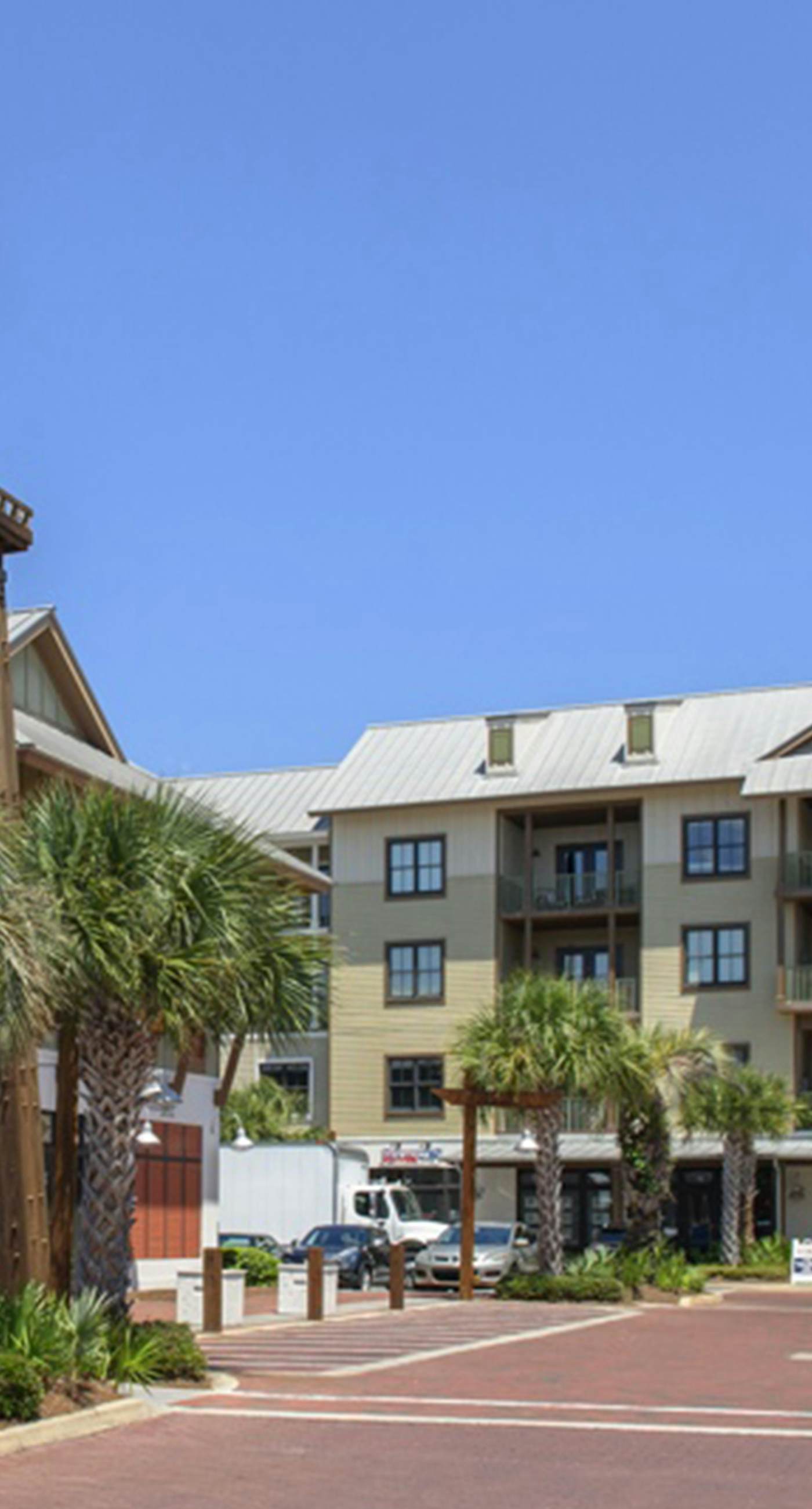 Stylish condo with pools, fitness center & tram to the beach