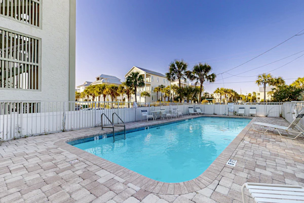 Fourth floor oceanfront condo with pool access, ocean views, and washer/dryer
