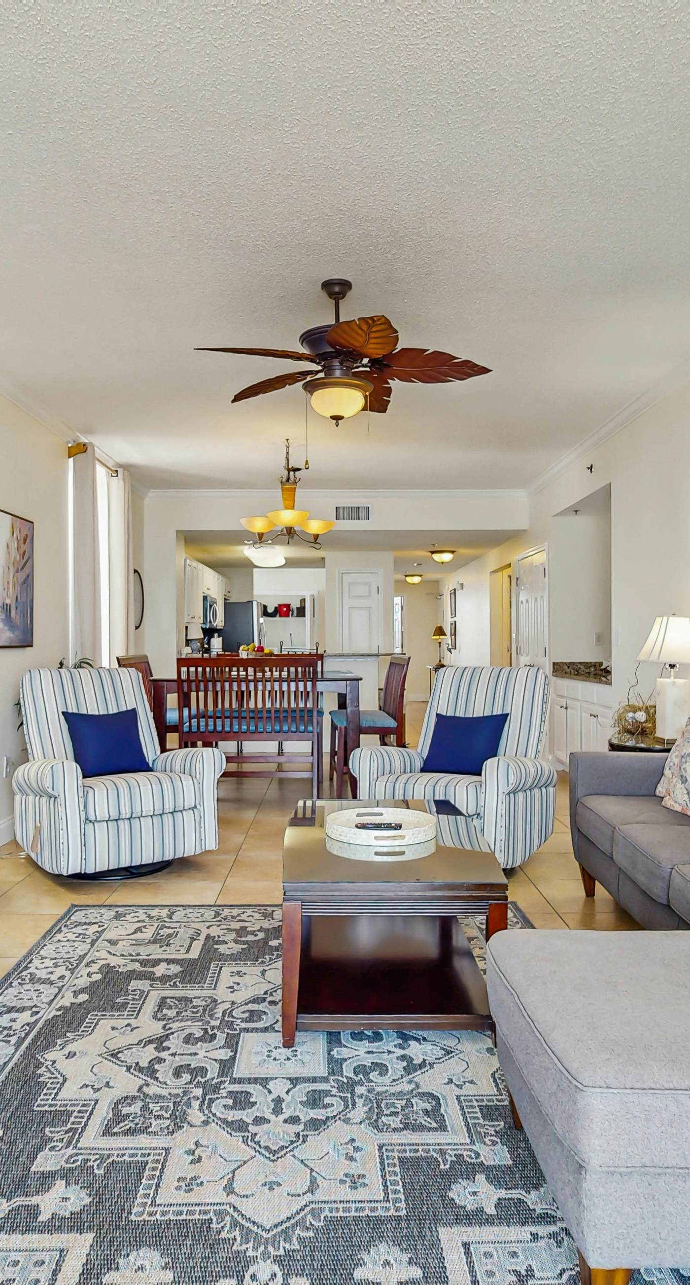 Gulf-front snowbird-friendly condo with pools, tennis, hot tub, balcony, gym, AC