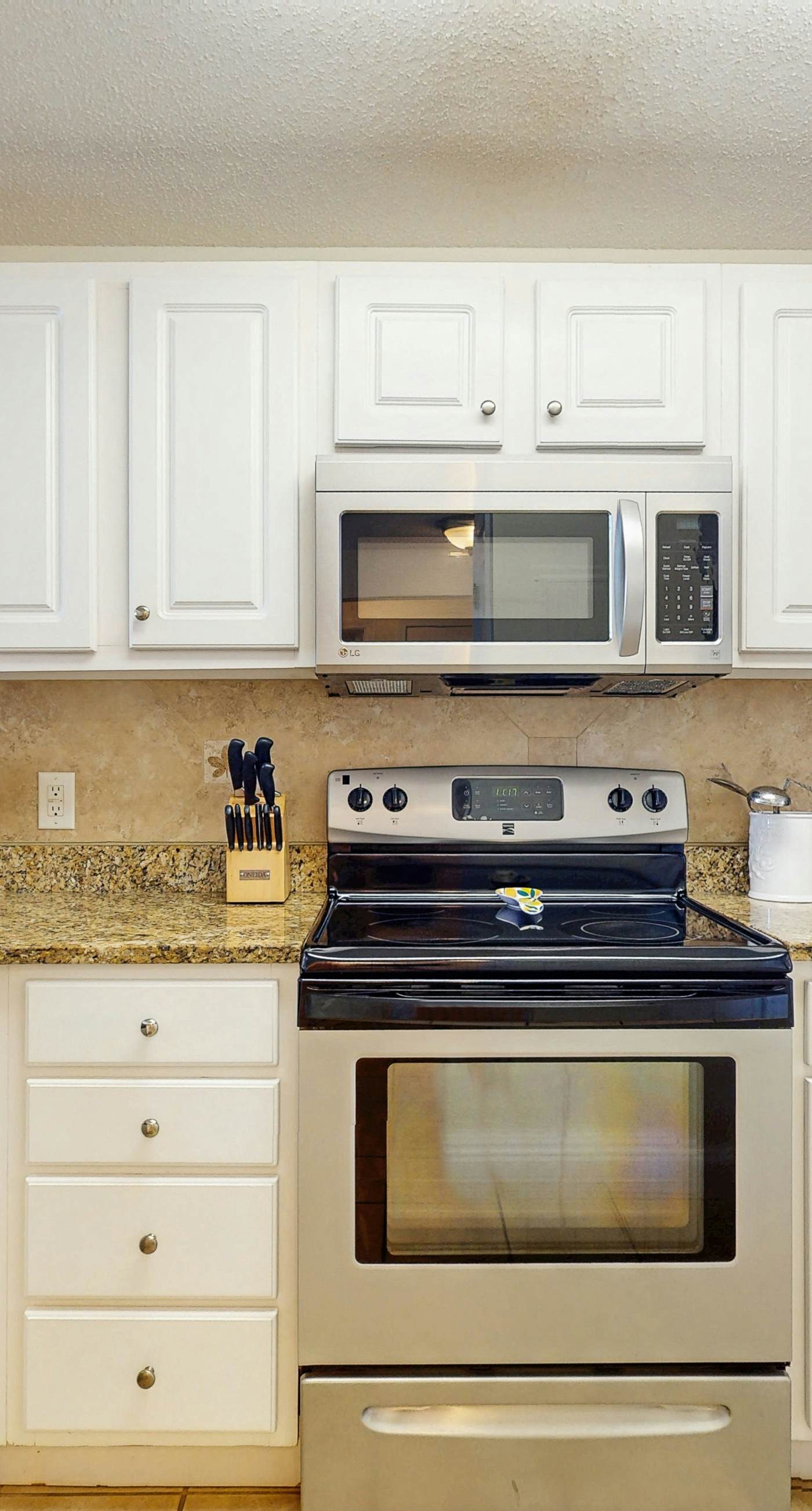 Gulf-front snowbird-friendly condo with pools, tennis, hot tub, balcony, gym, AC