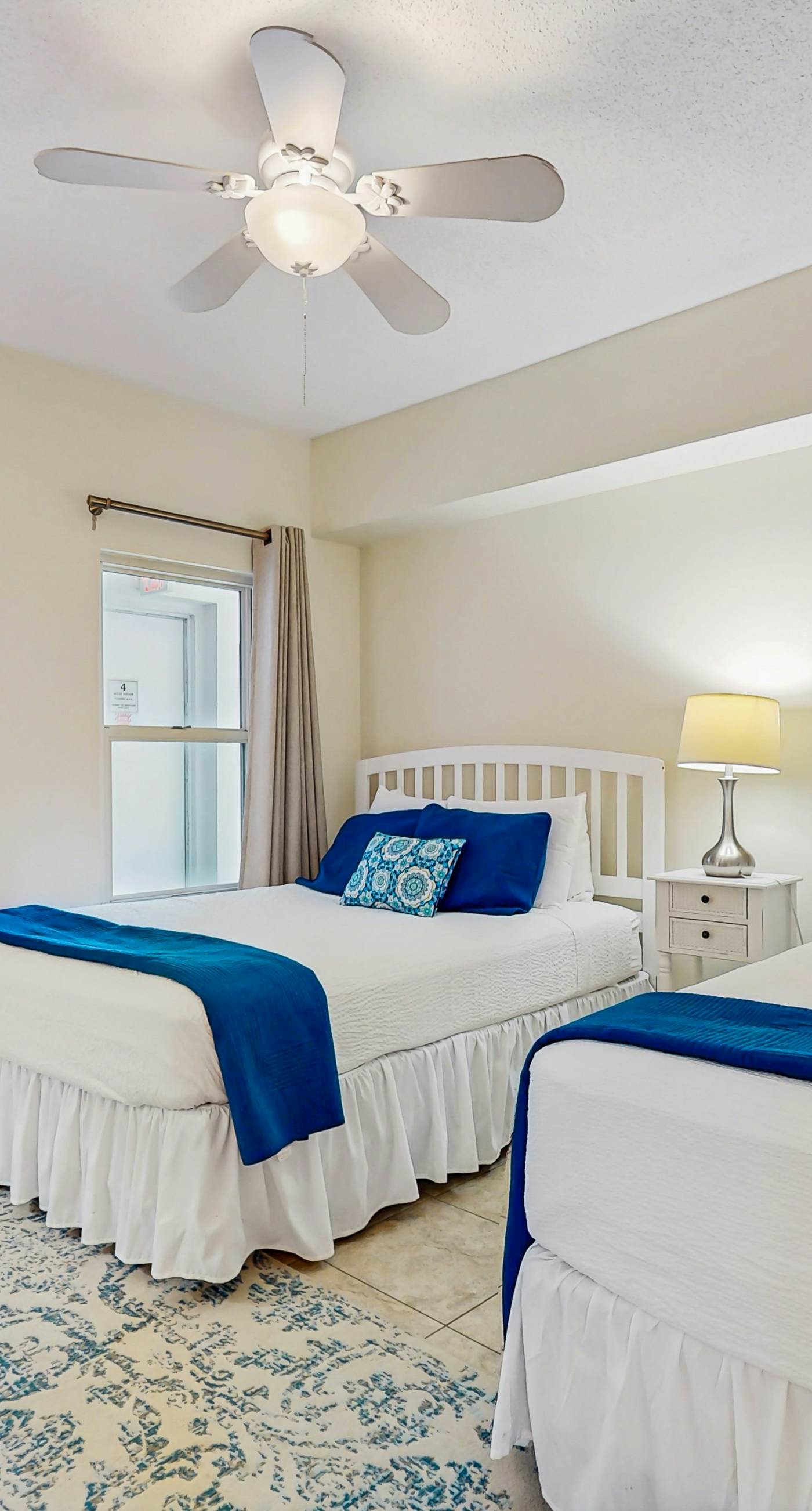 Gulf-front snowbird-friendly condo with pools, tennis, hot tub, balcony, gym, AC