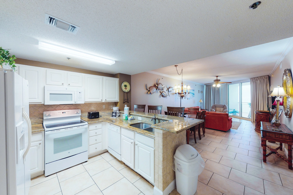 Coastal condo steps to beach with pools, hot tub, gym & amazing views