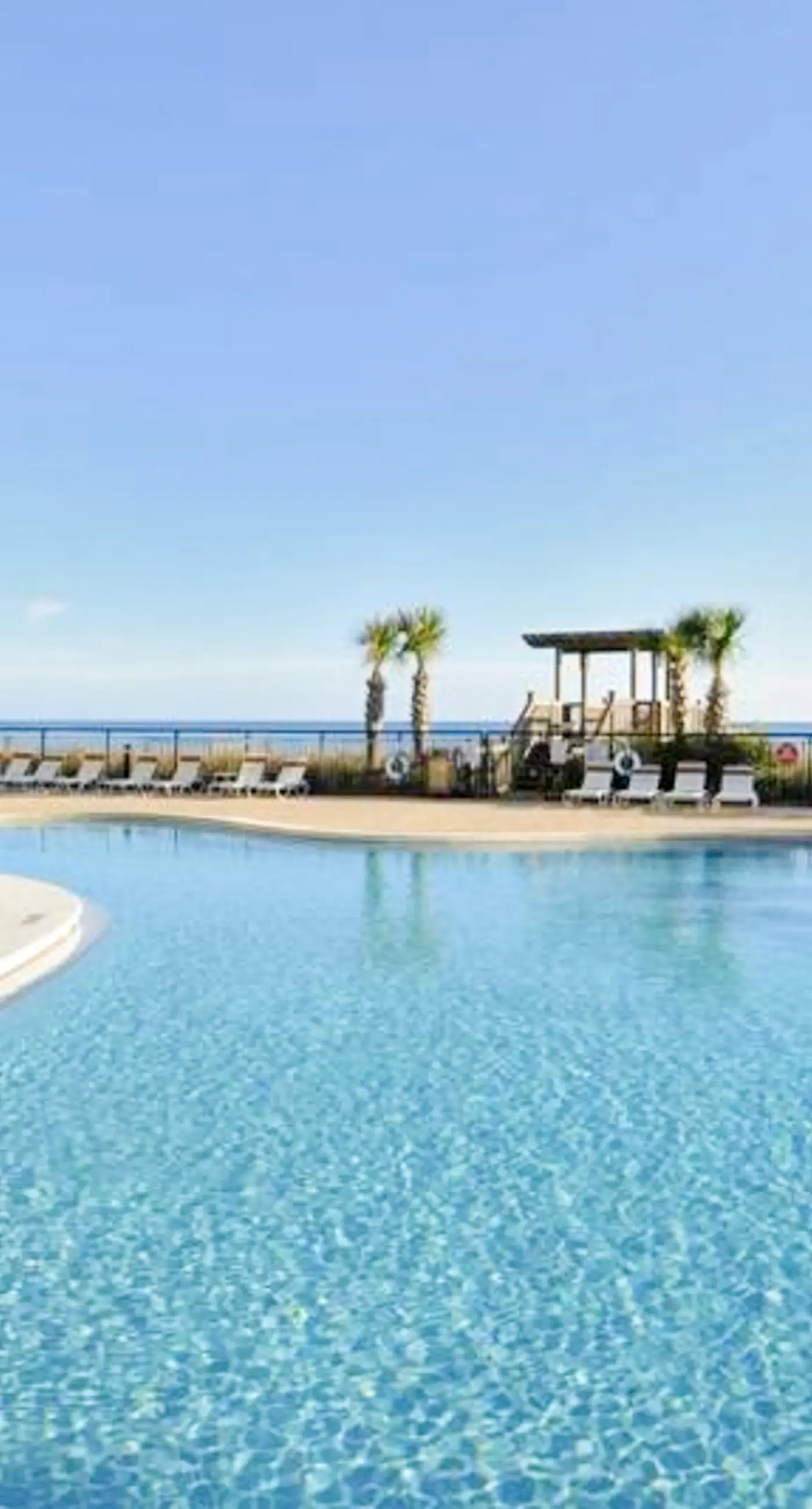 13th-floor condo with amazing views, pools, gym & beach access