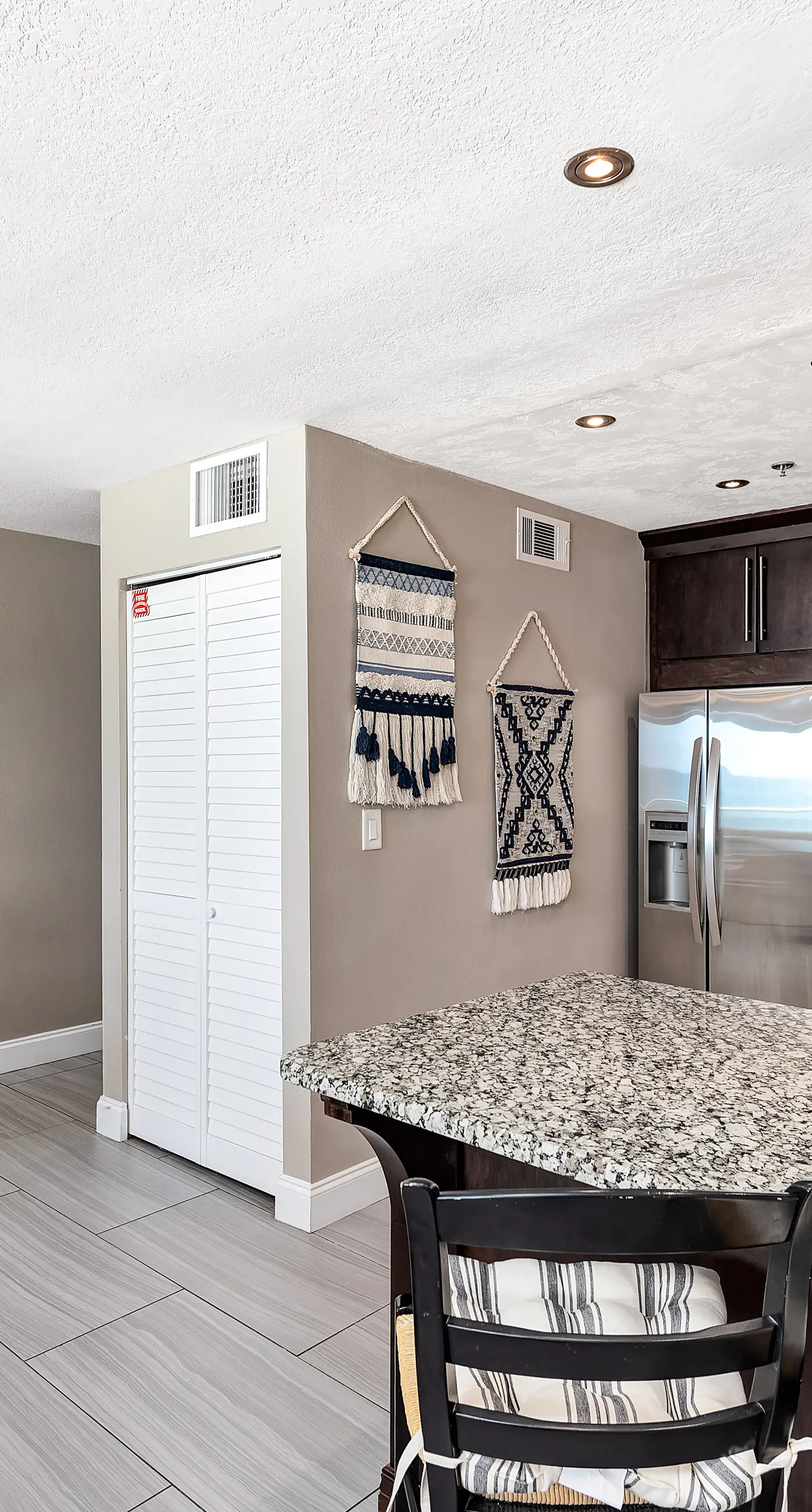 Stylish oceanfront condo w/ pool access, private W/D, ocean views, & central AC