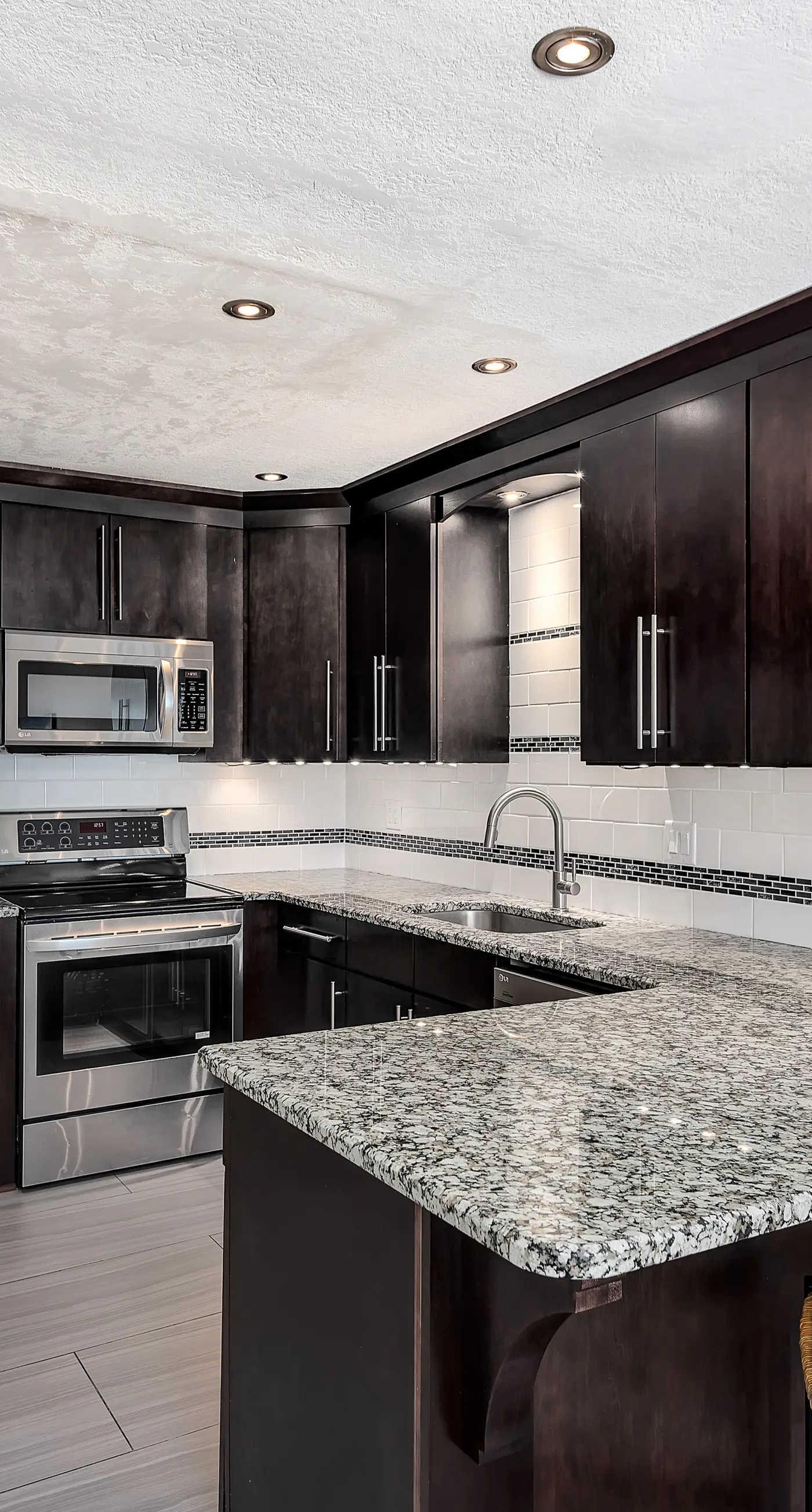 Stylish oceanfront condo w/ pool access, private W/D, ocean views, & central AC