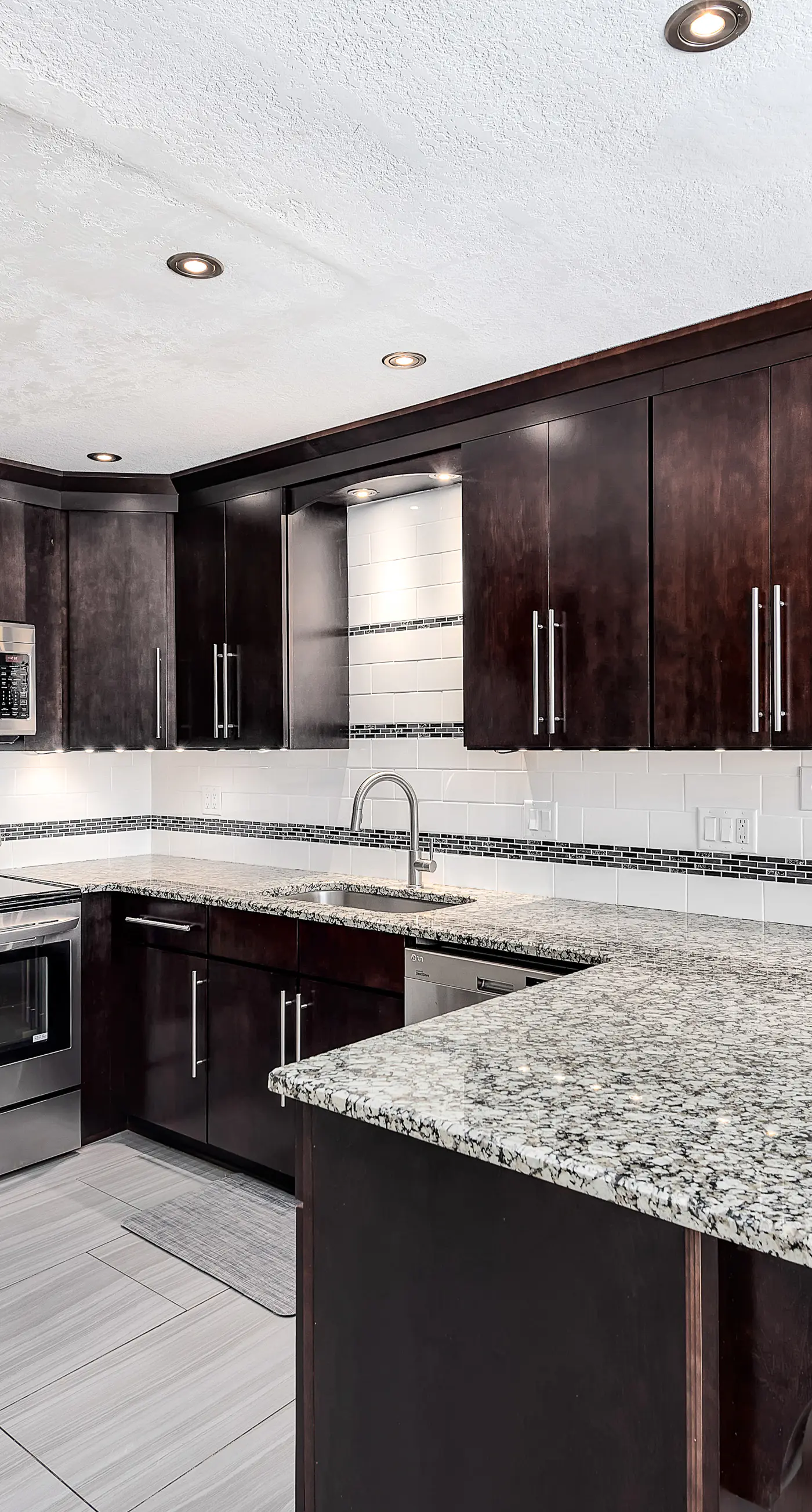 Stylish oceanfront condo w/ pool access, private W/D, ocean views, & central AC