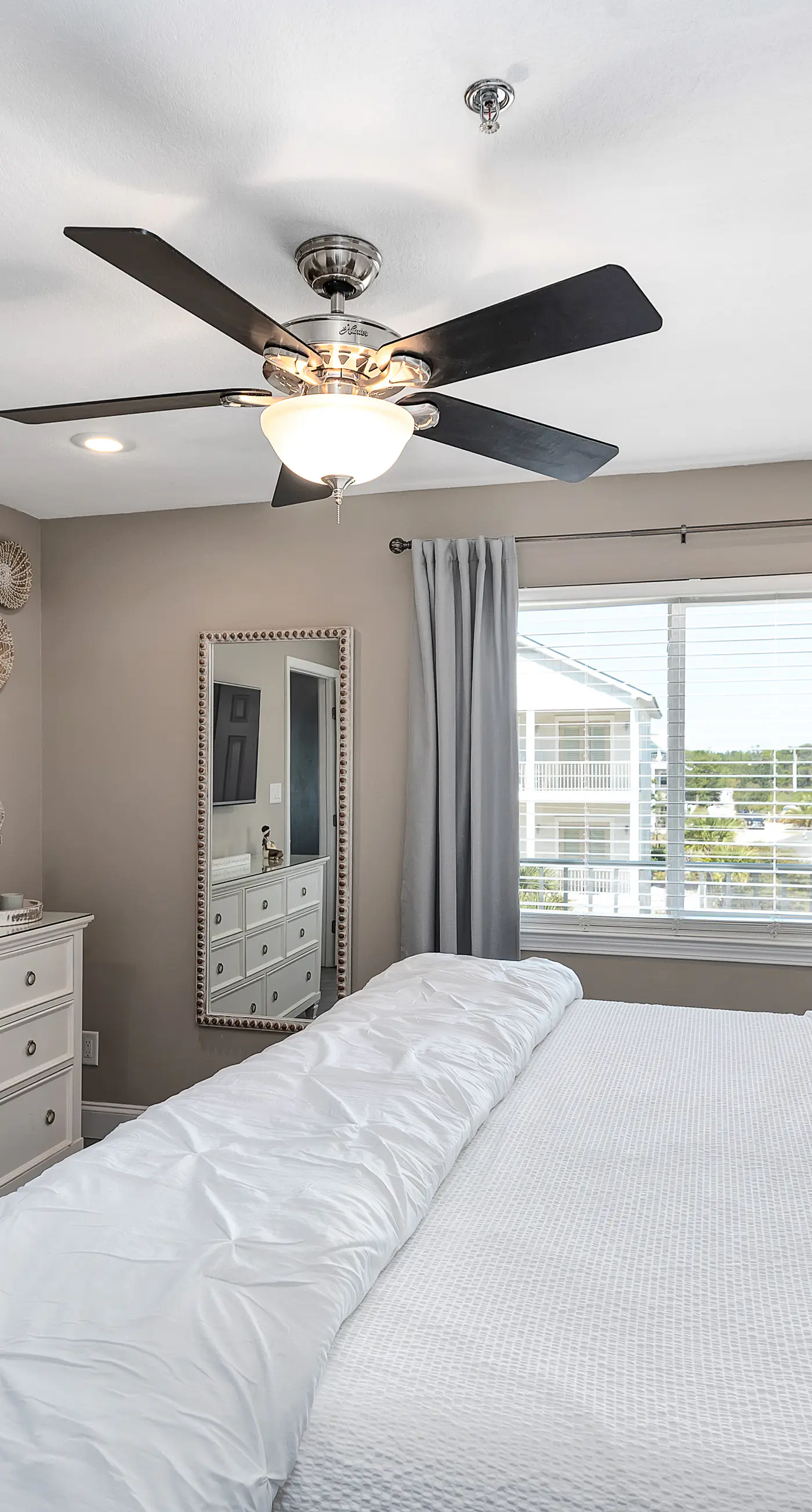 Stylish oceanfront condo w/ pool access, private W/D, ocean views, & central AC
