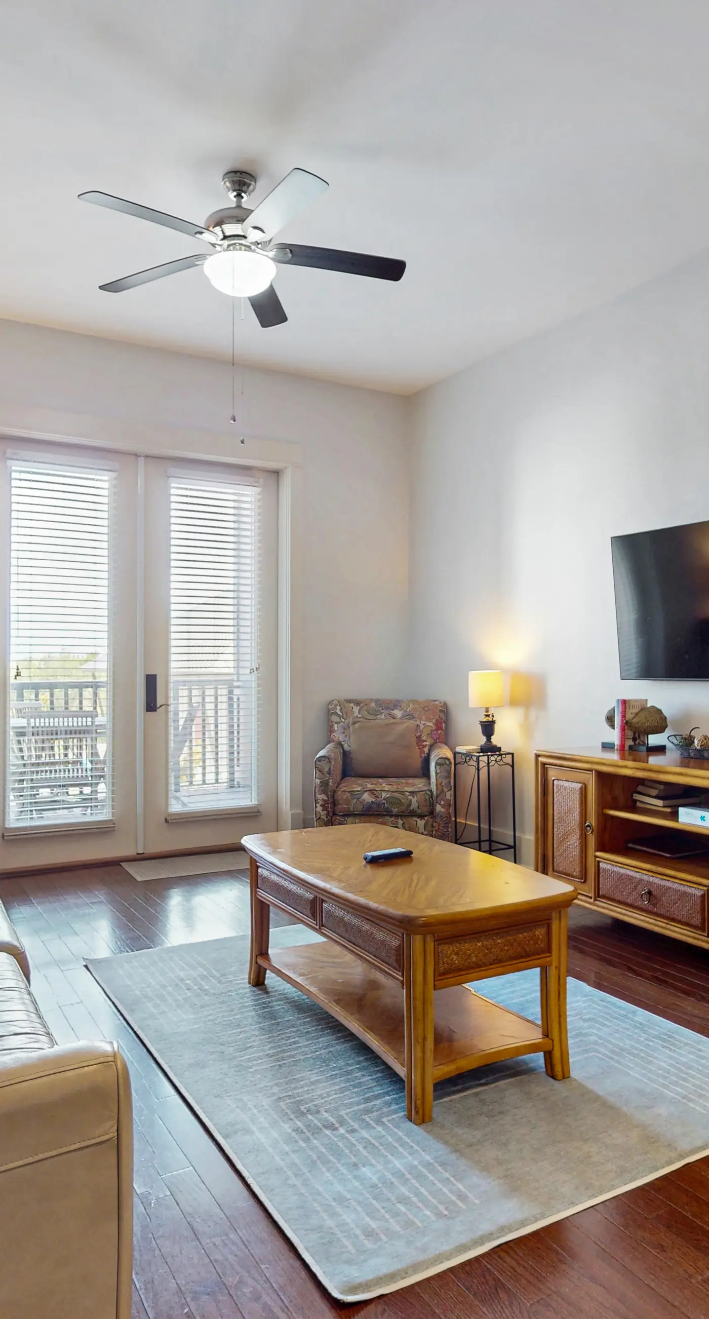 Polished condo with balcony & pools - one block from the beach