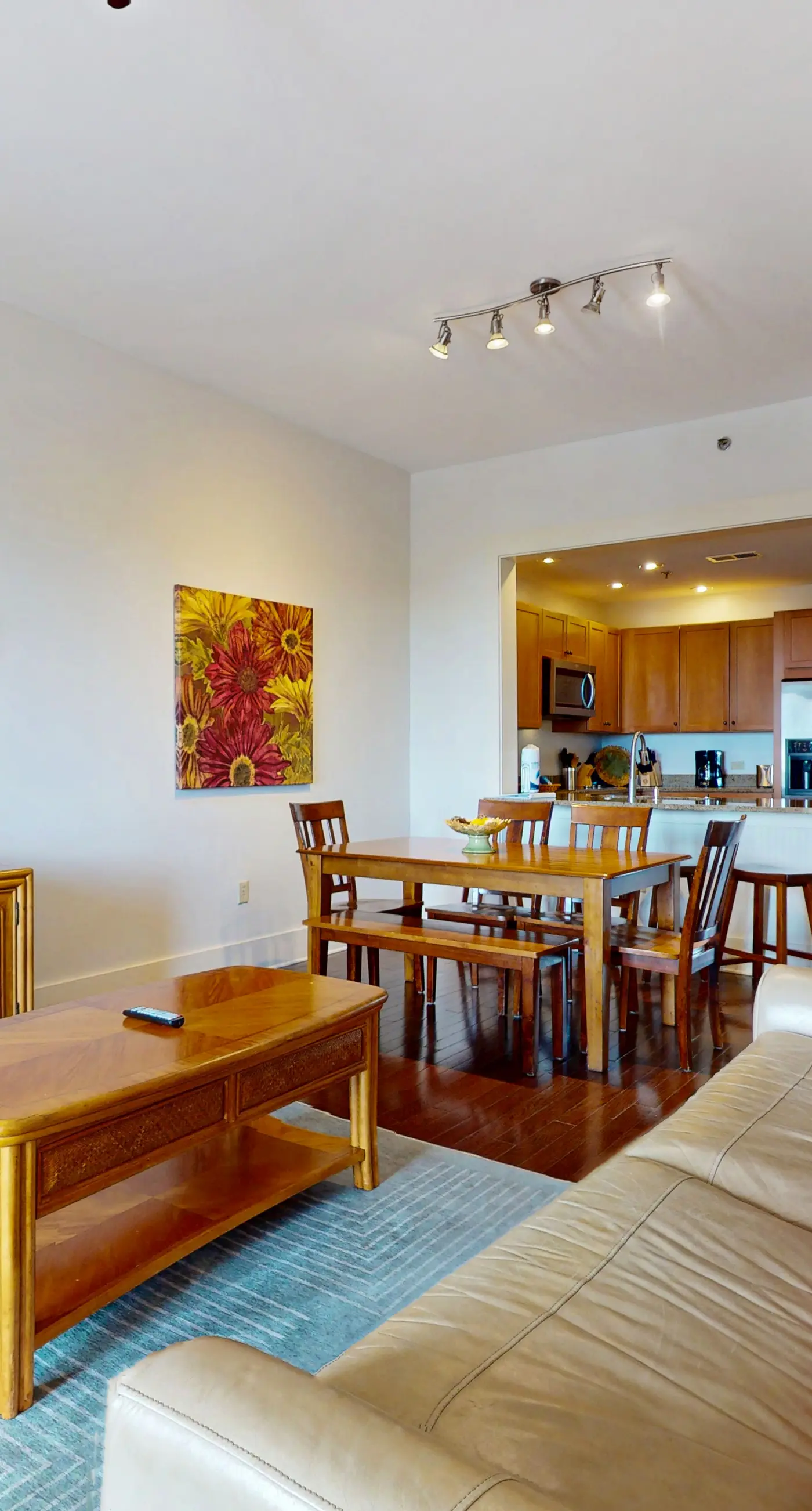 Polished condo with balcony & pools - one block from the beach