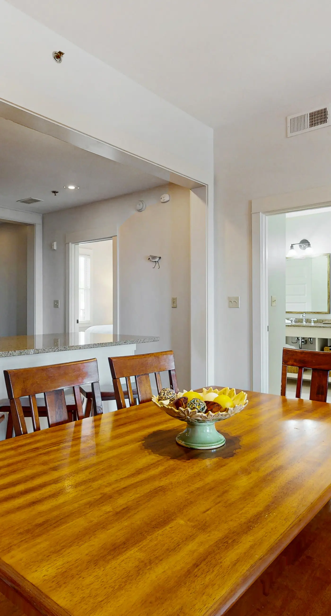 Polished condo with balcony & pools - one block from the beach