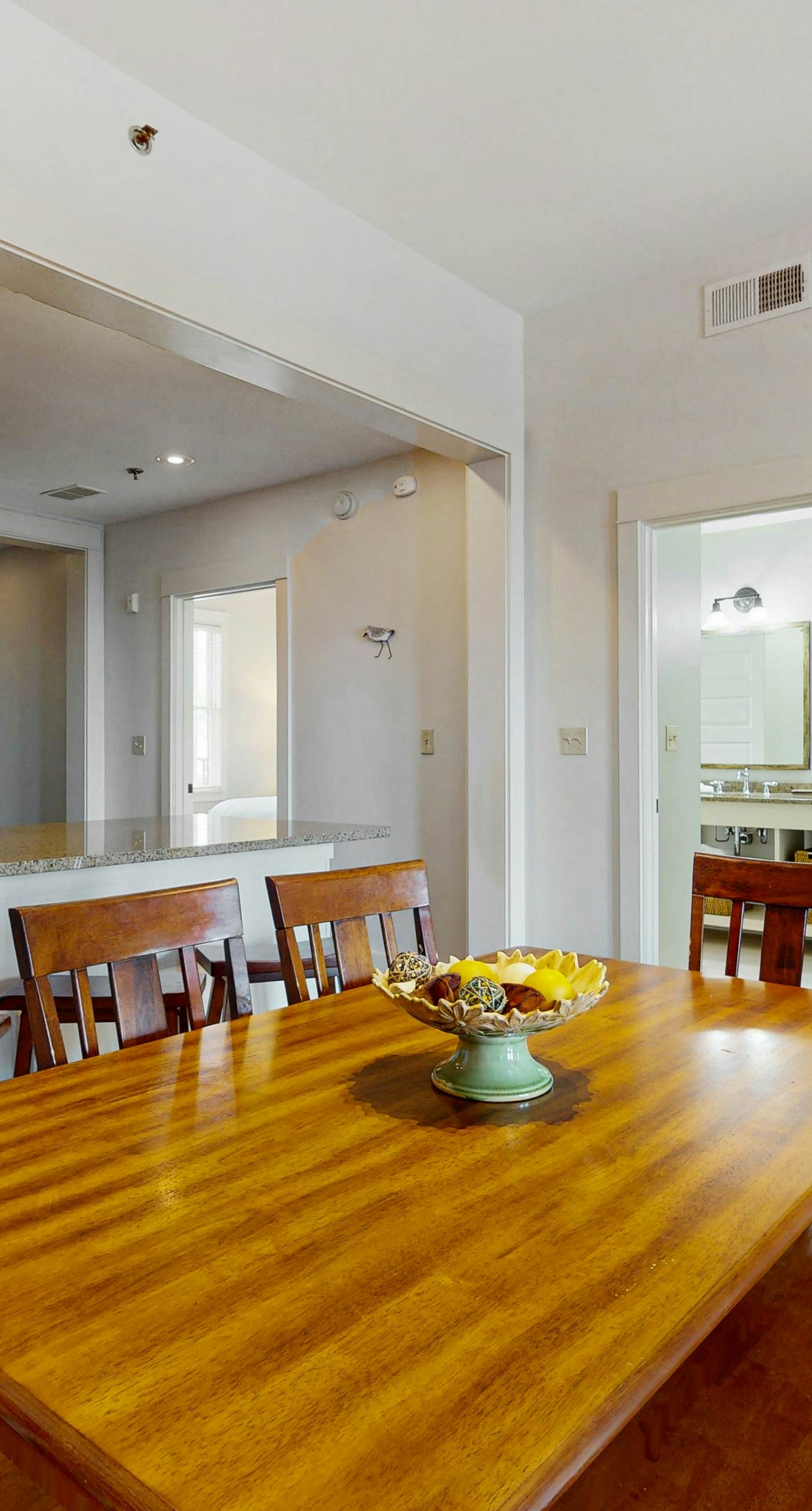 Polished condo with balcony & pools - one block from the beach