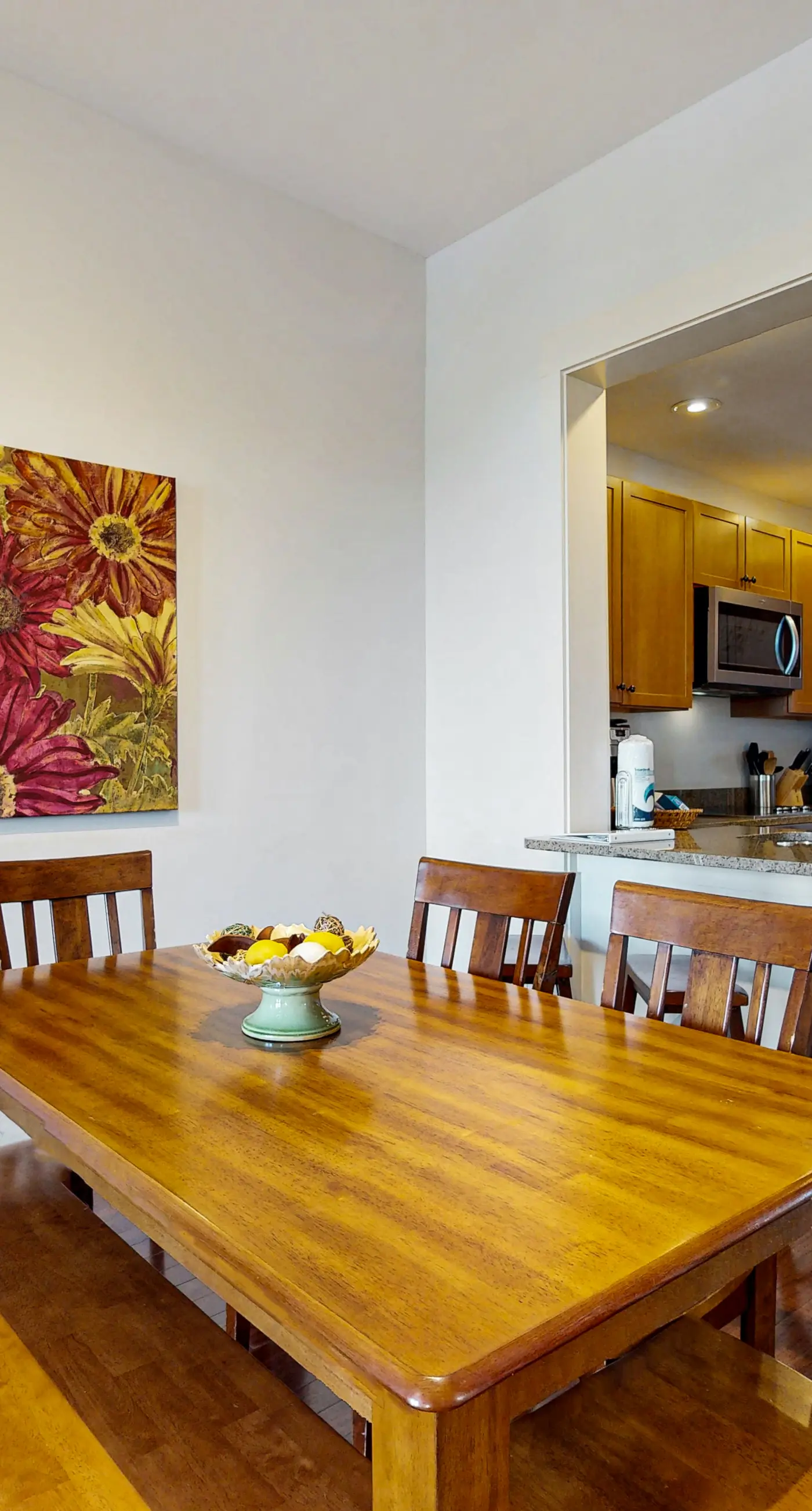 Polished condo with balcony & pools - one block from the beach