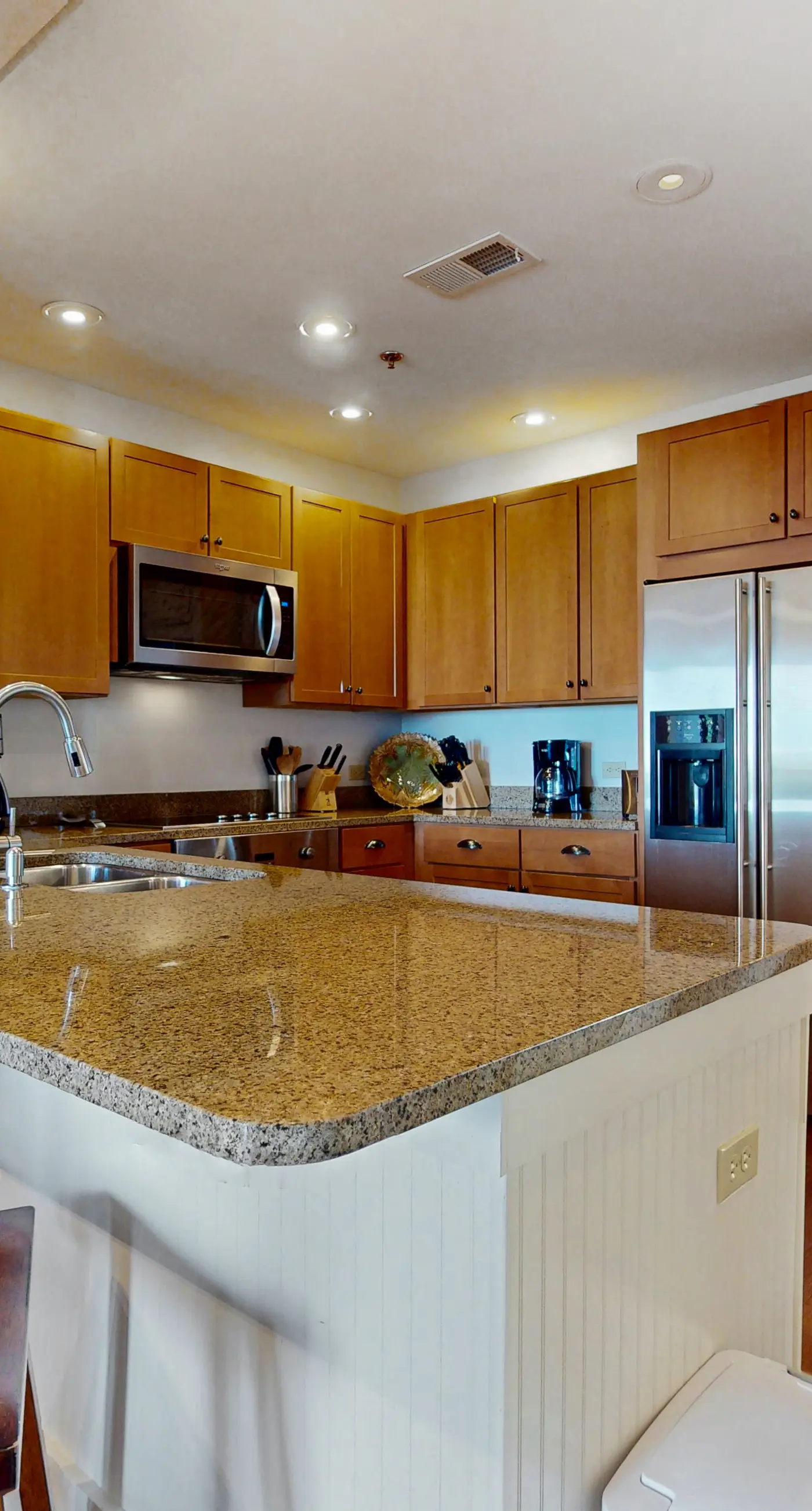 Polished condo with balcony & pools - one block from the beach