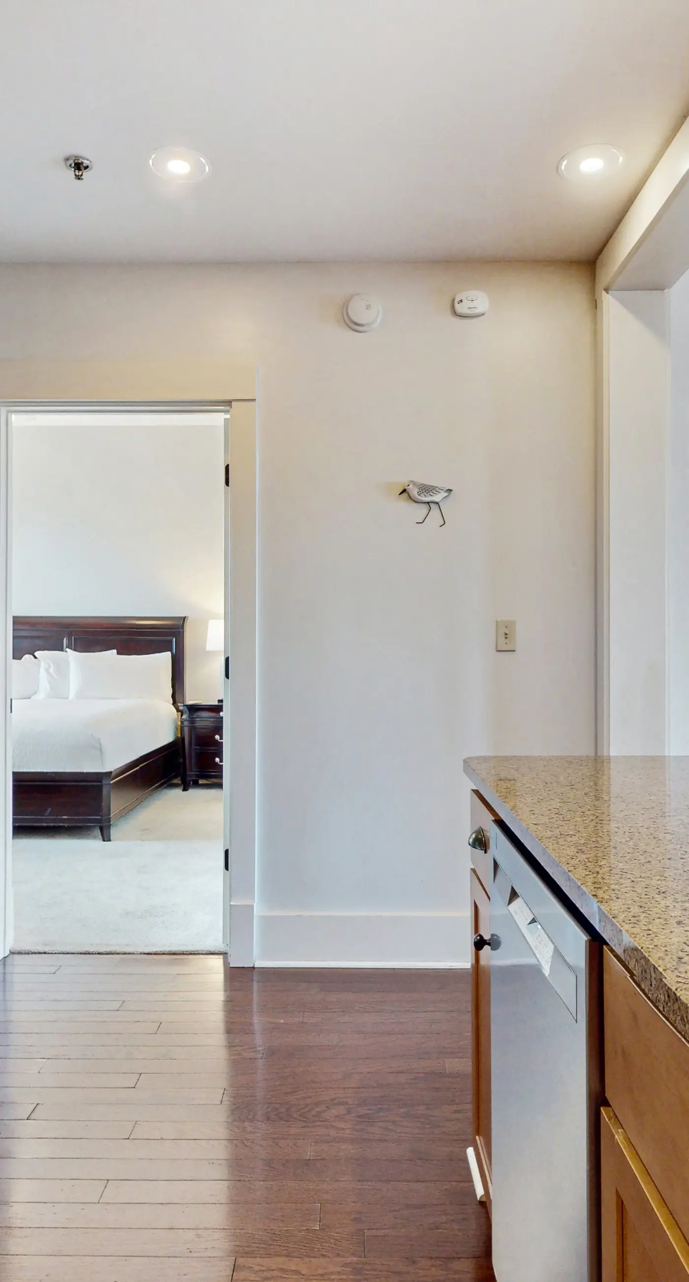 Polished condo with balcony & pools - one block from the beach