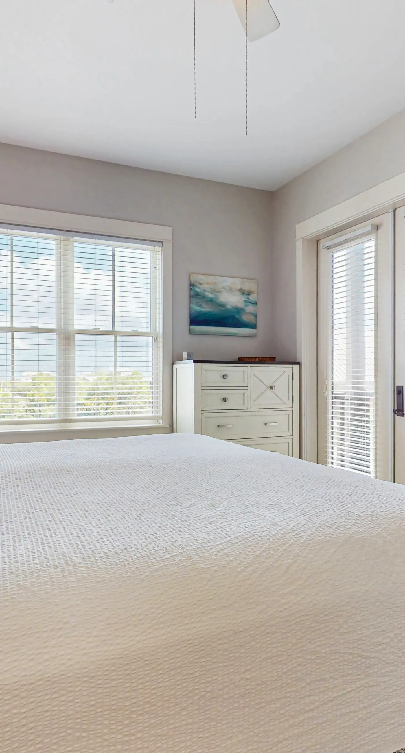 Polished condo with balcony & pools - one block from the beach