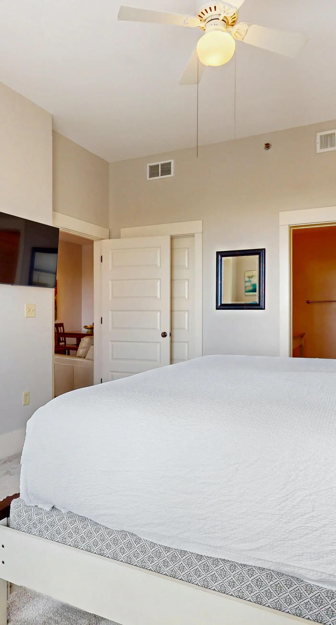 Polished condo with balcony & pools - one block from the beach