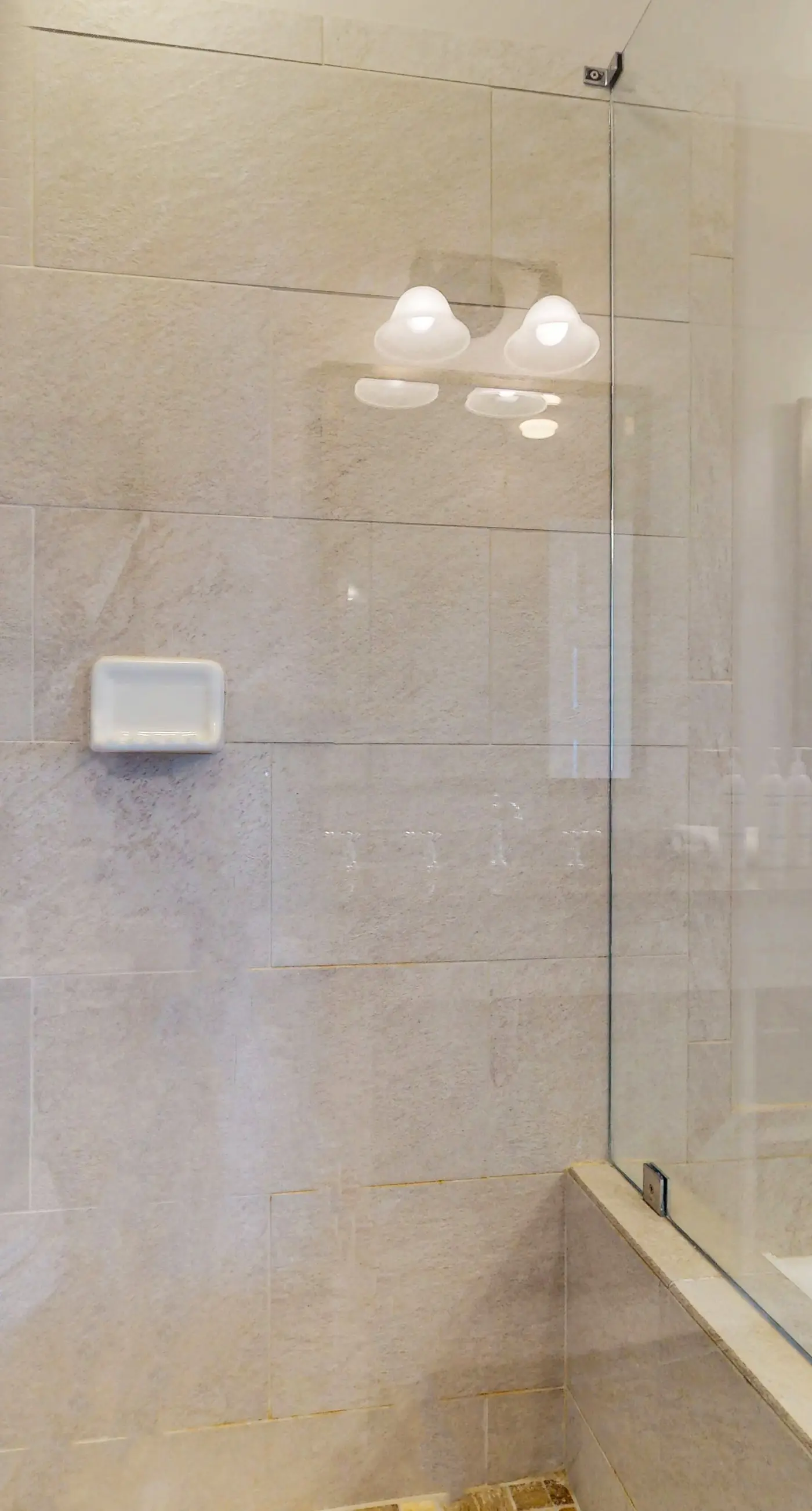 Polished condo with balcony & pools - one block from the beach