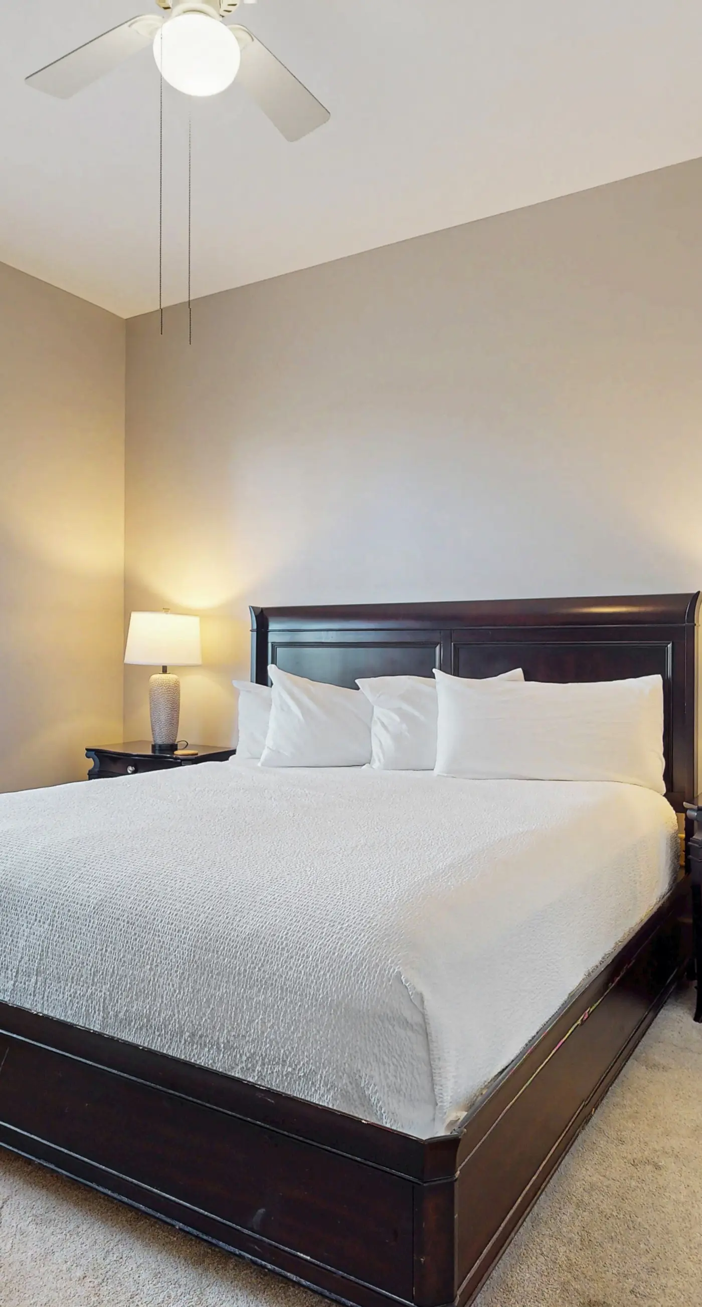 Polished condo with balcony & pools - one block from the beach