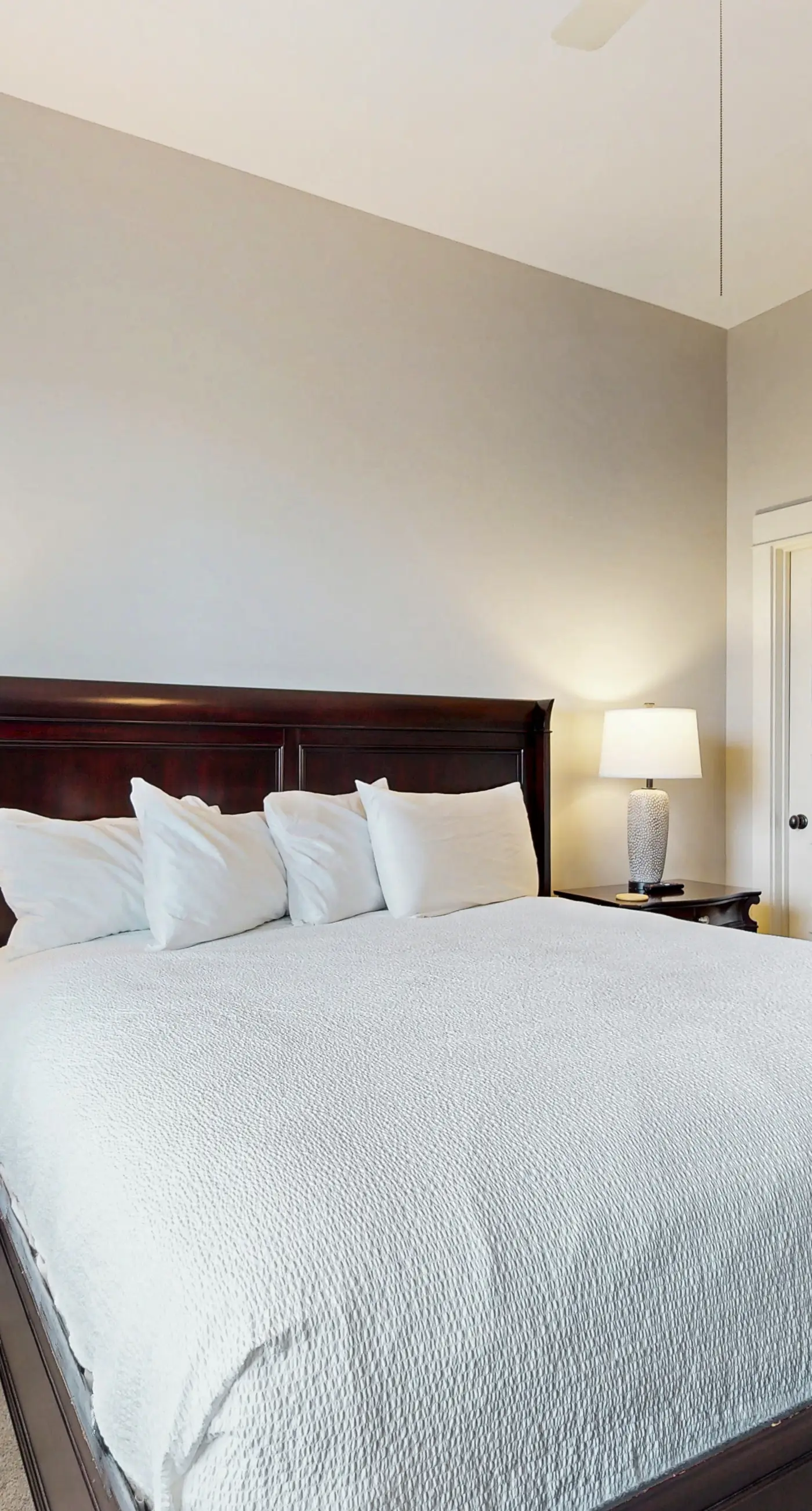 Polished condo with balcony & pools - one block from the beach