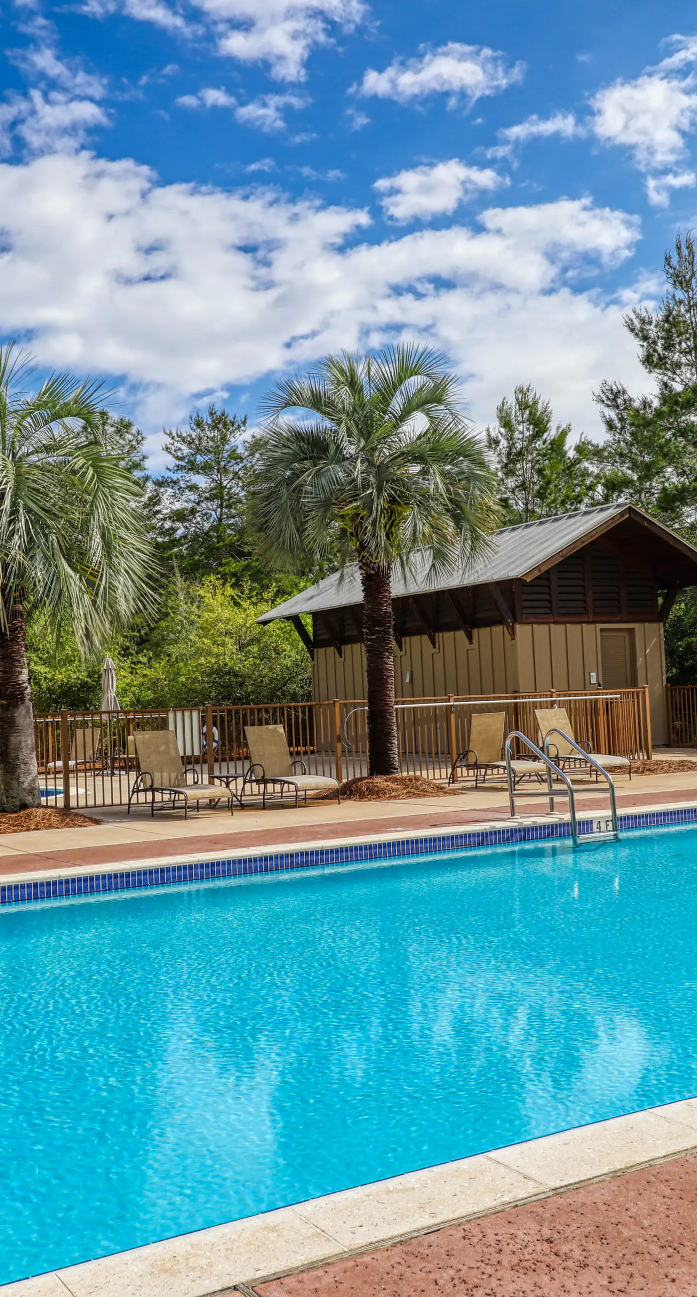 Polished condo with balcony & pools - one block from the beach