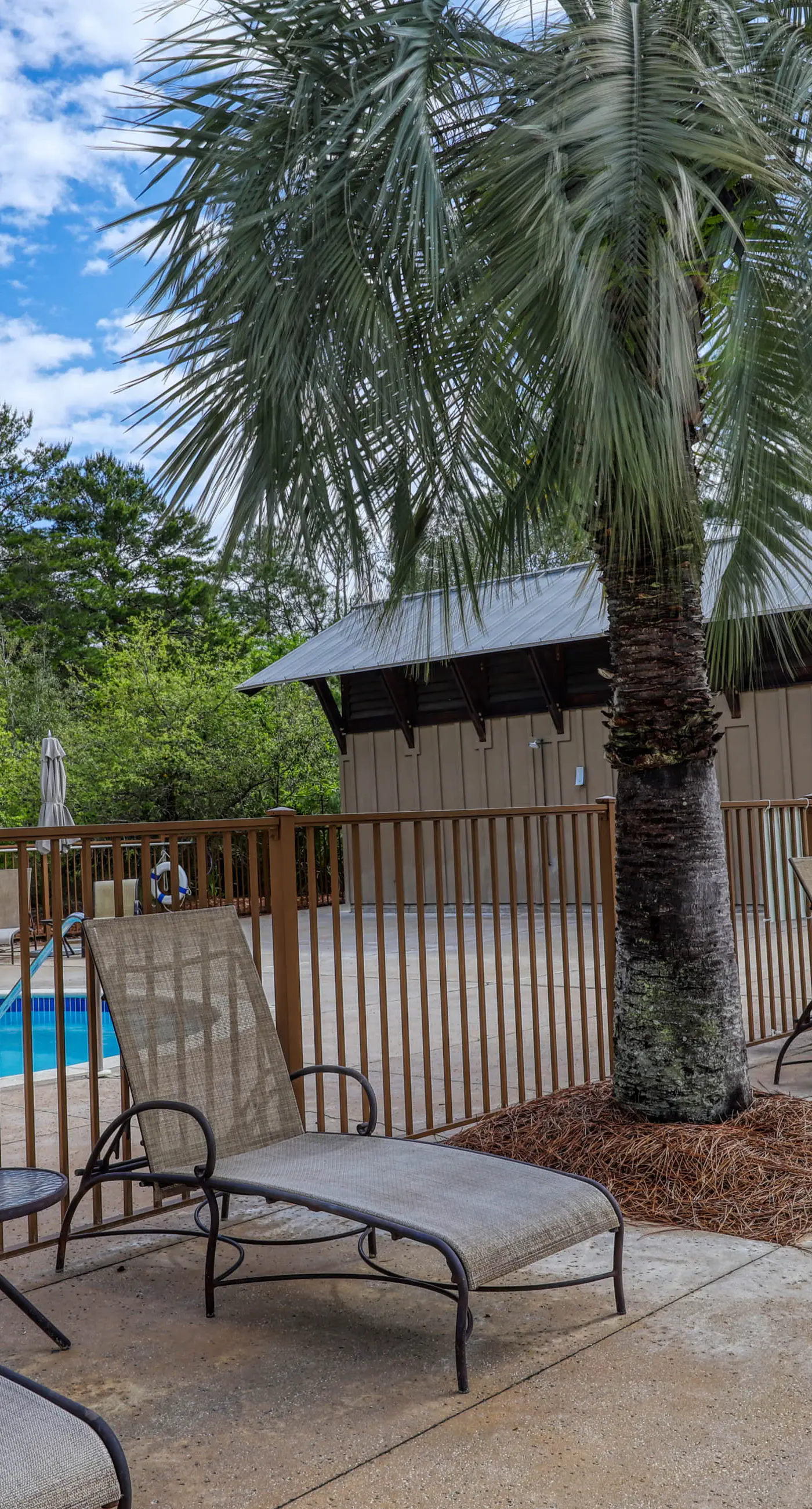 Polished condo with balcony & pools - one block from the beach