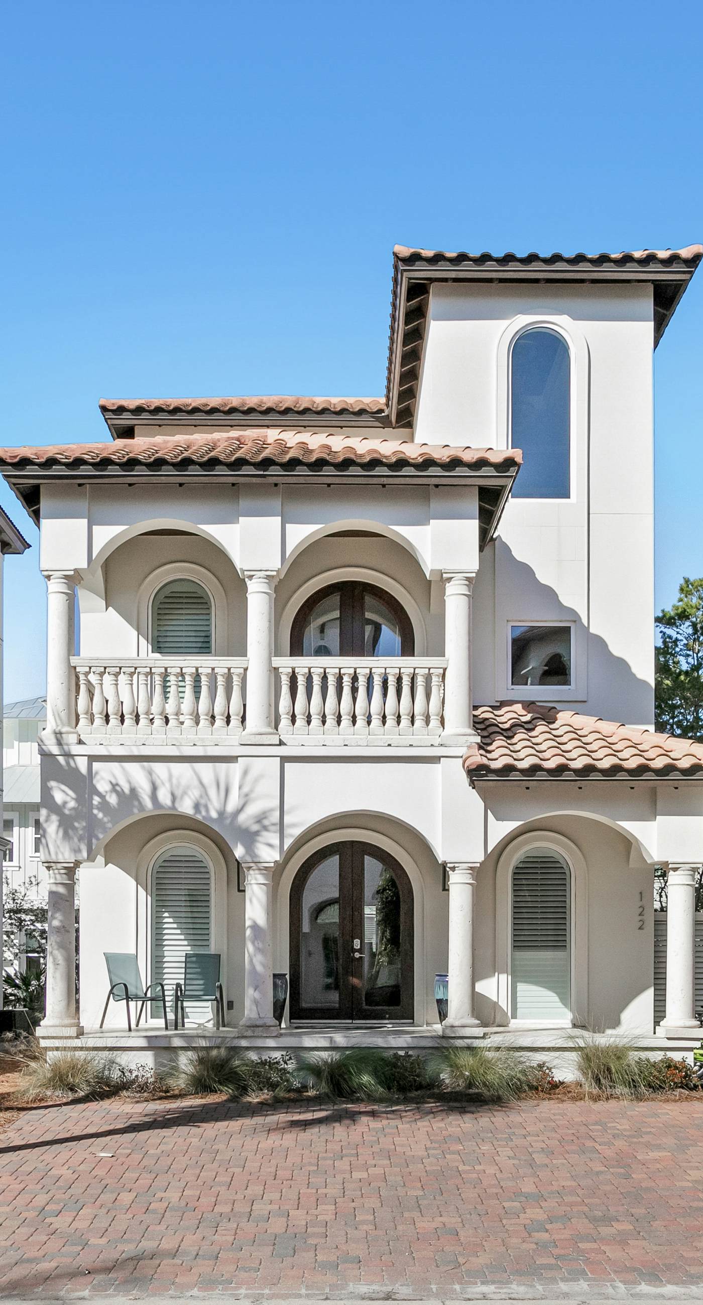 Luxe coastal villa with patio, firepit, grill, balcony, ac, & high-speed wifi