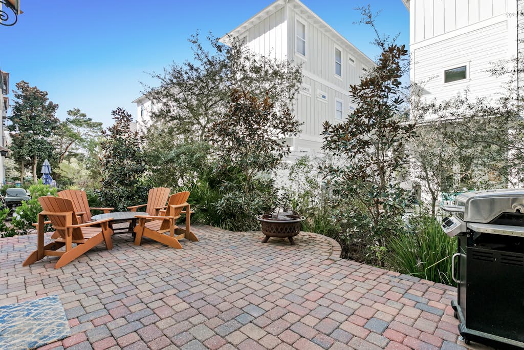 Luxe coastal villa with patio, firepit, grill, balcony, ac, & high-speed wifi