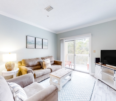 Peaceful condo with pool access, central AC, and washer&dryer