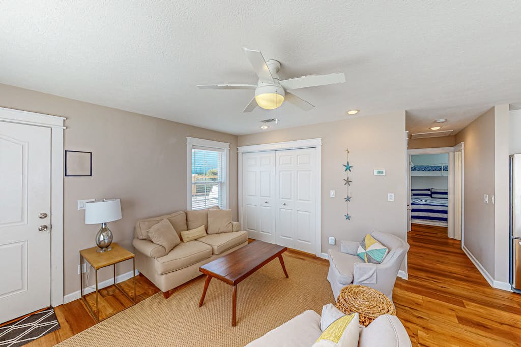 Bright home near the beach with enclosed patio, grill, outdoor shower, W/D, AC