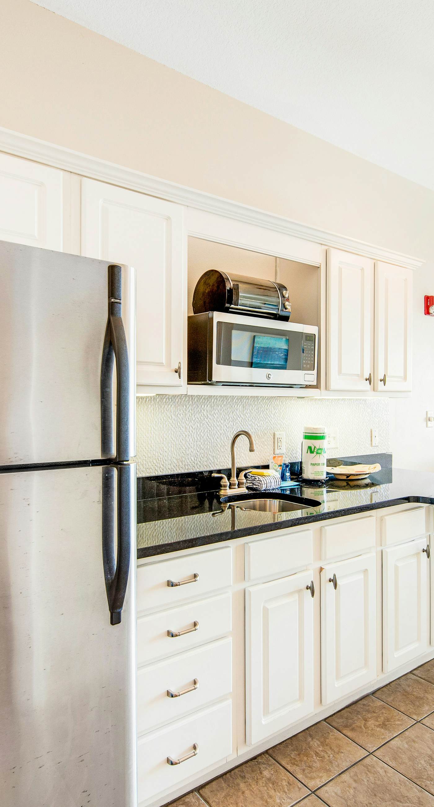 Comfortable studio with shared outdoor pool, hot tub, BBQ area, and pool views