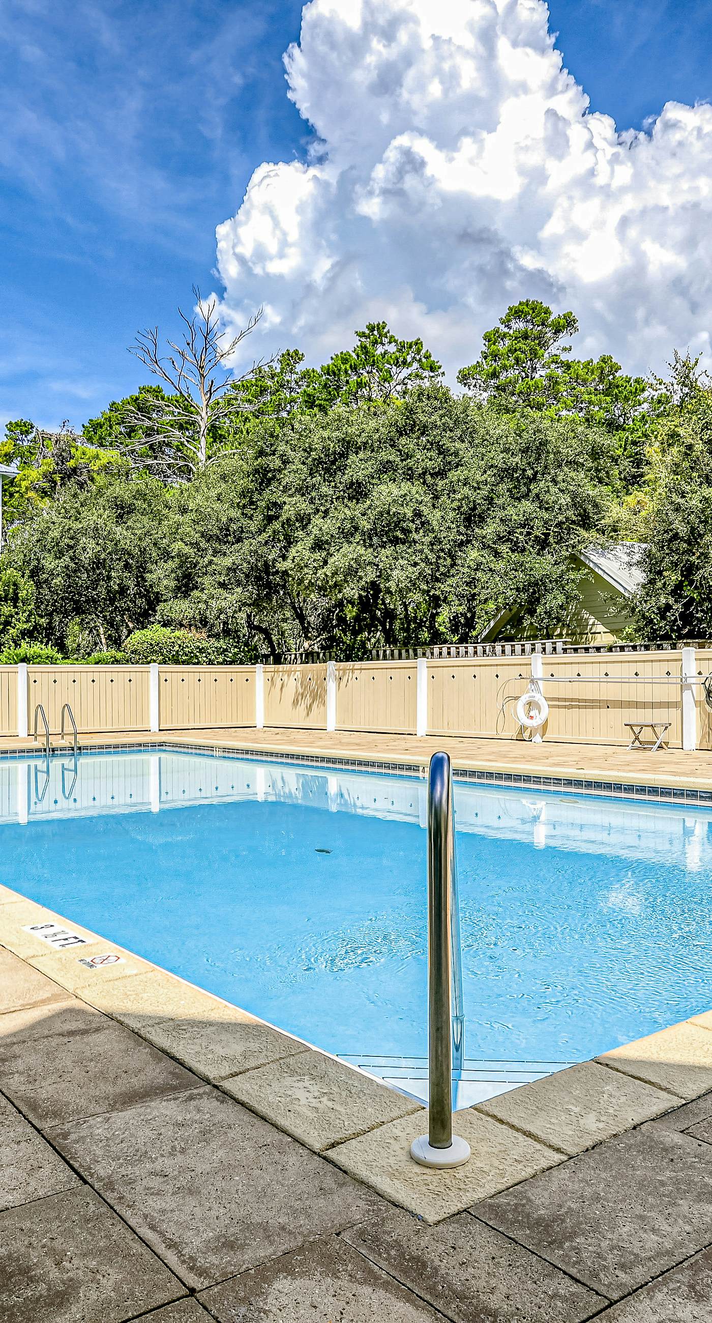 Dog-friendly home with community pool, flat top grill, and custom coffee bar