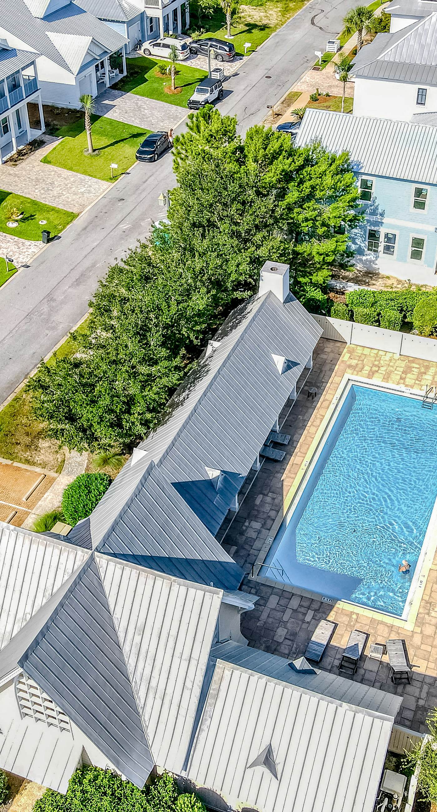 Dog-friendly home with community pool, flat top grill, and custom coffee bar