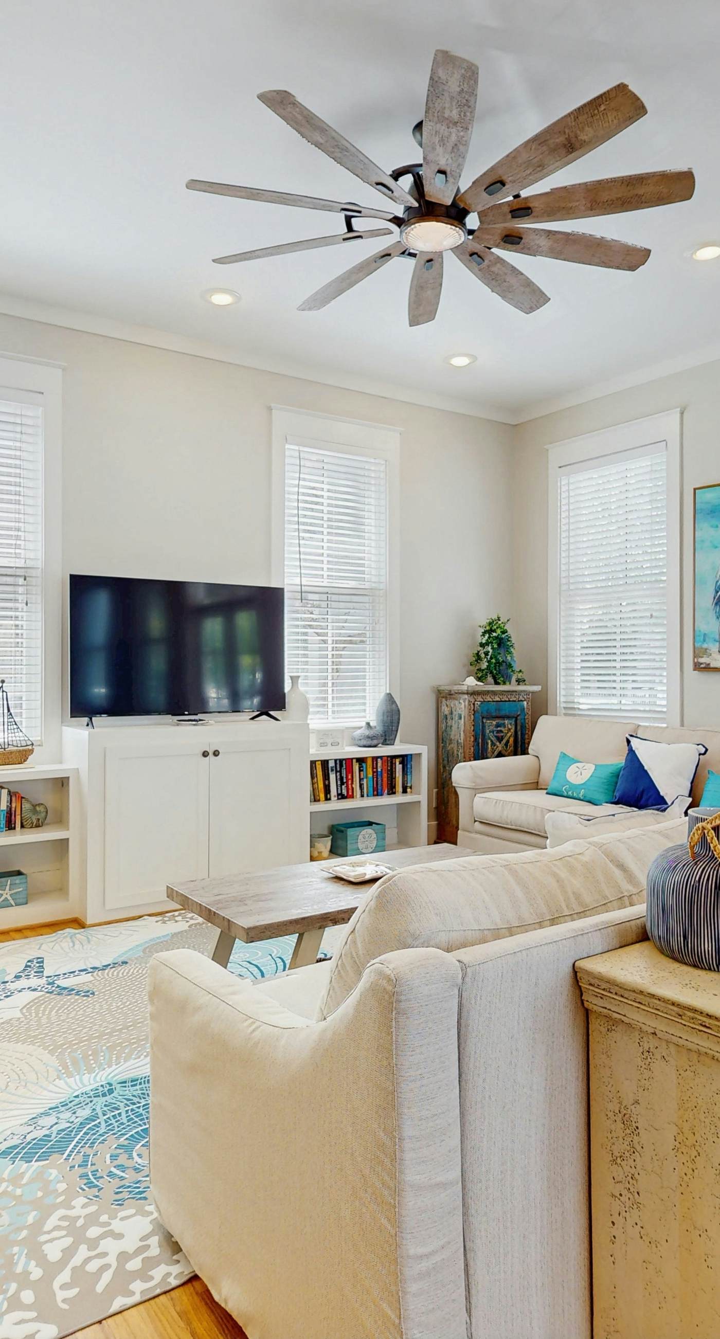 Coastal home with 2 community pools, bikes, front porch & balcony - near beach